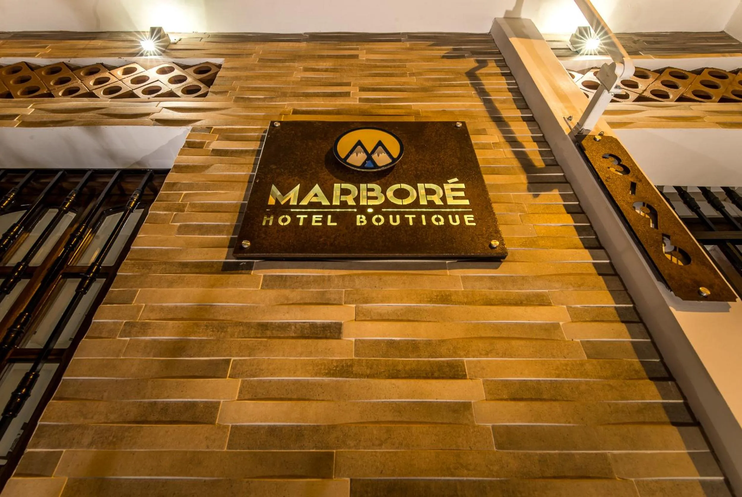 Property logo or sign in Hotel Boutique Marbore