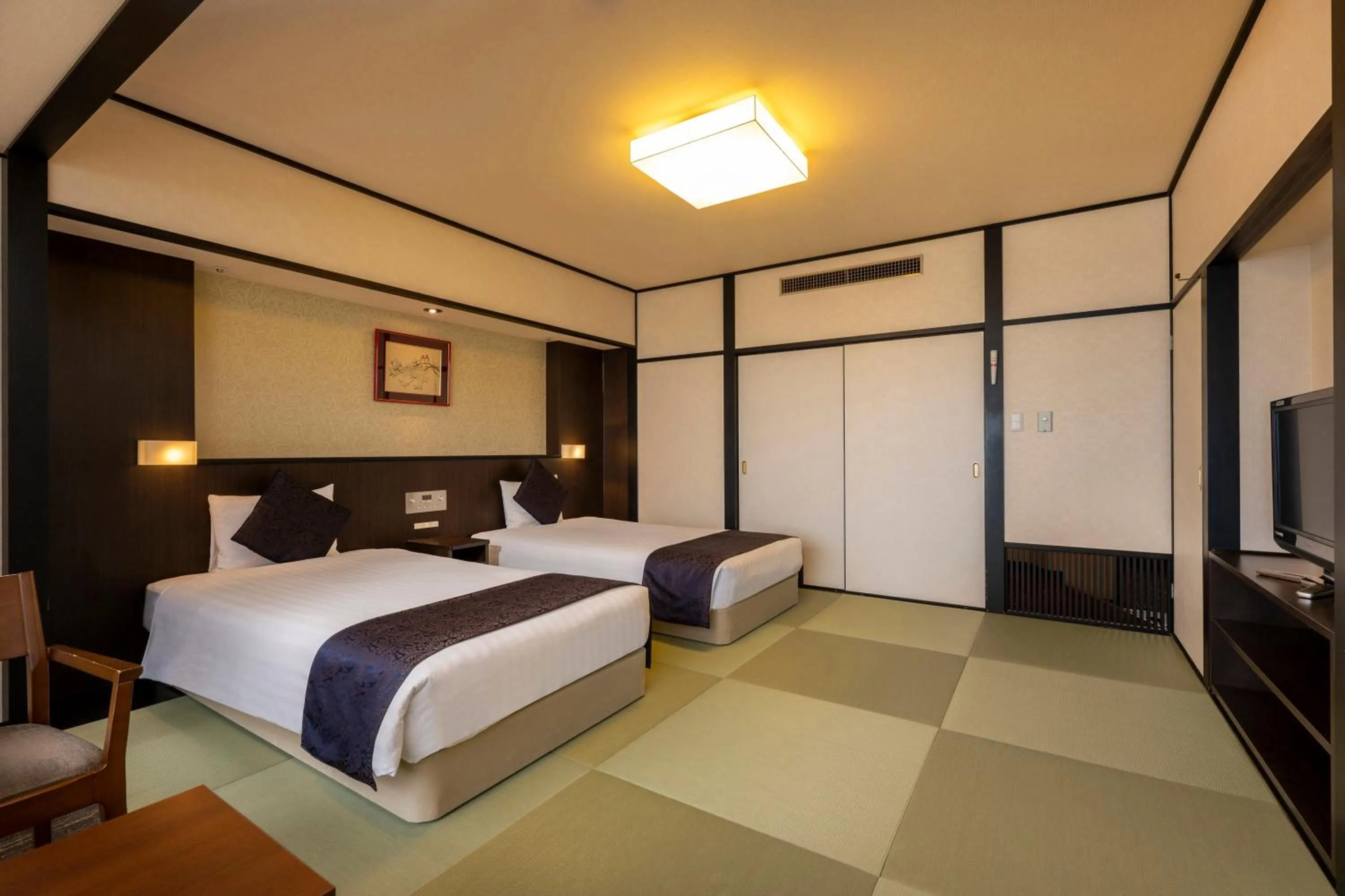 Photo of the whole room, Bed in KAMENOI HOTEL Kujukuri