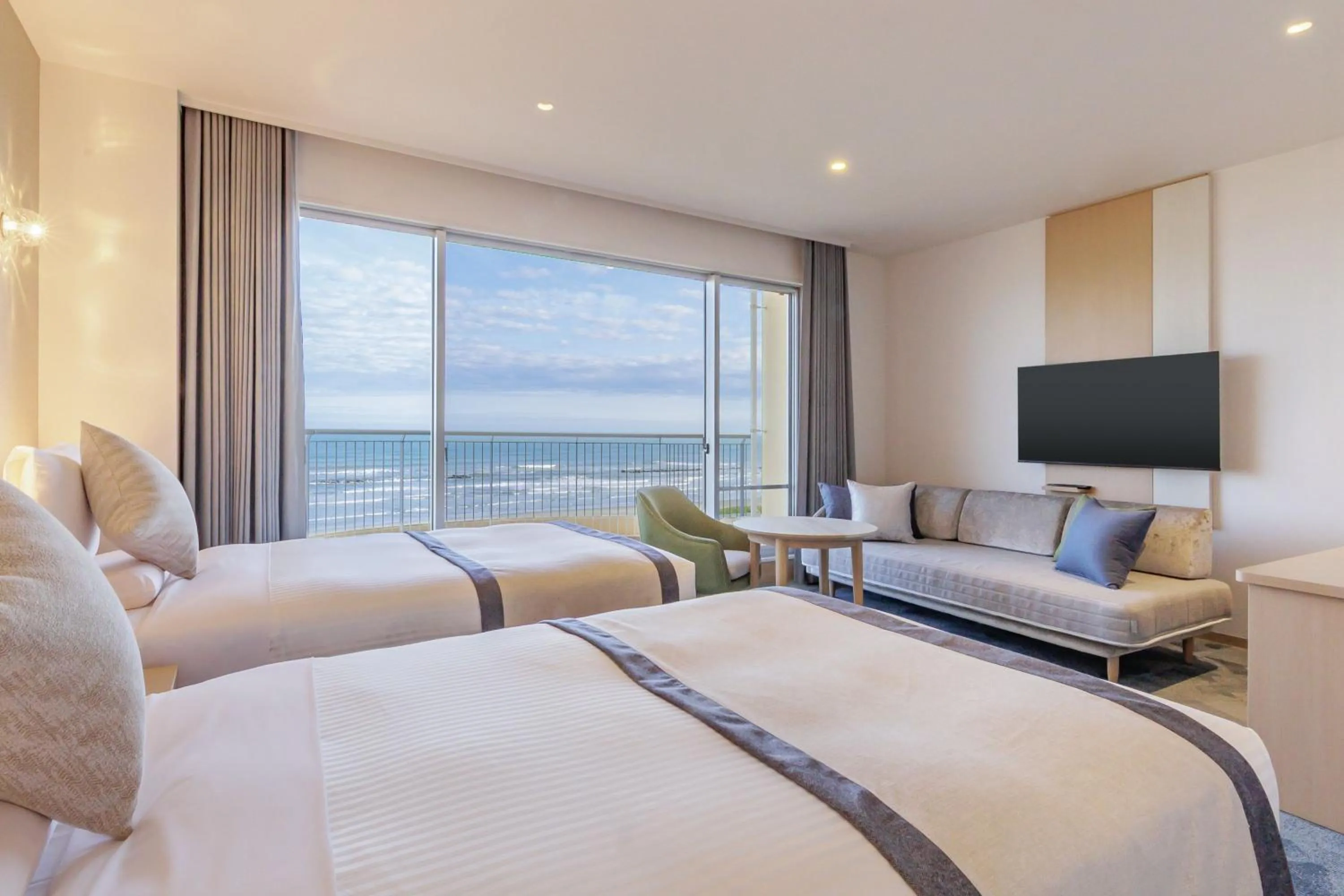 Bed in KAMENOI HOTEL Kujukuri