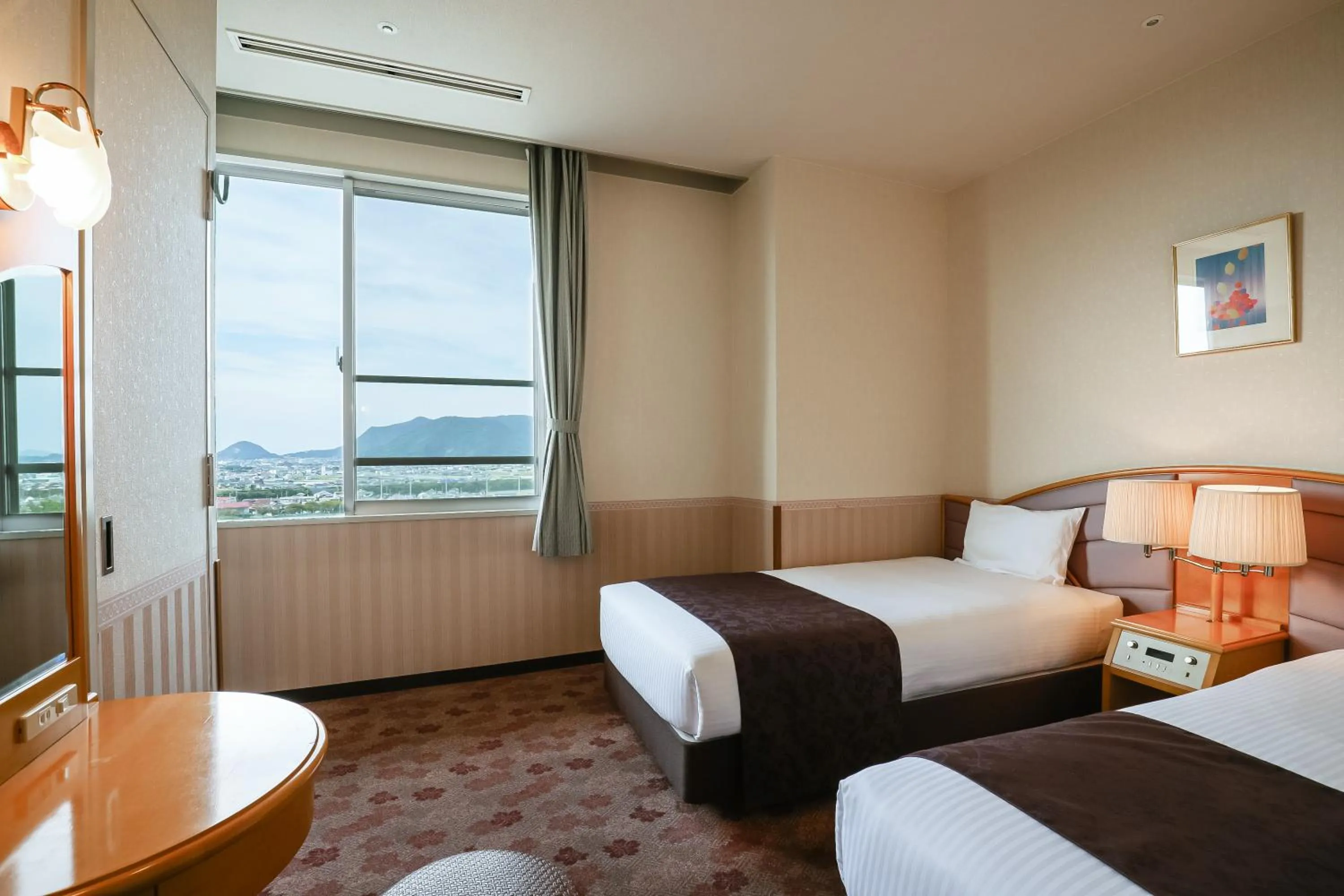 Bed in KAMENOI HOTEL Kanonji