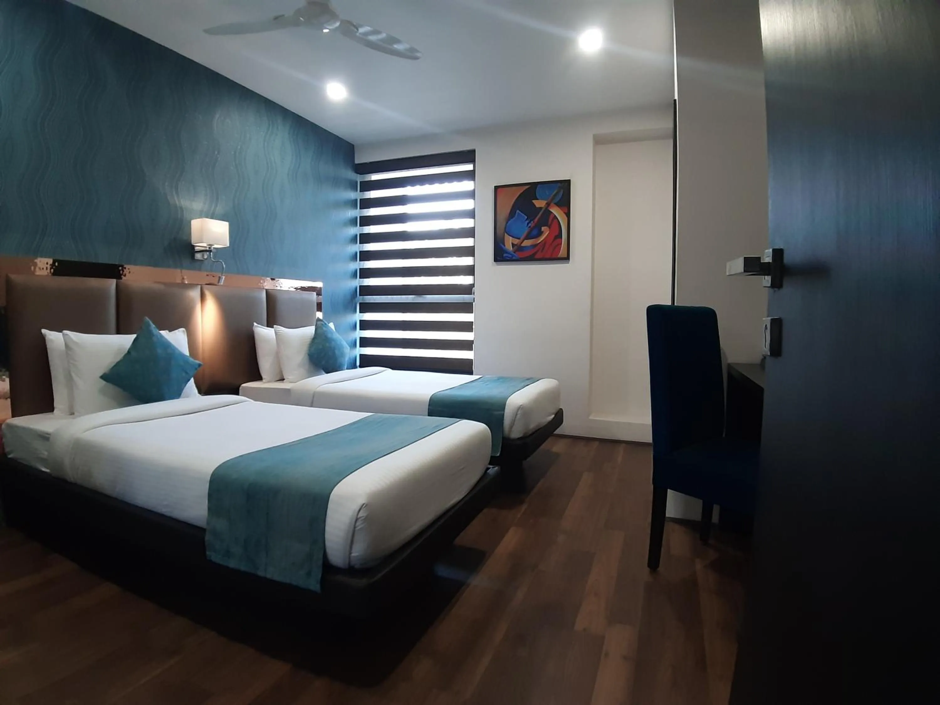 Photo of the whole room, Bed in The Opus Kolkata - A Boutique Hotel