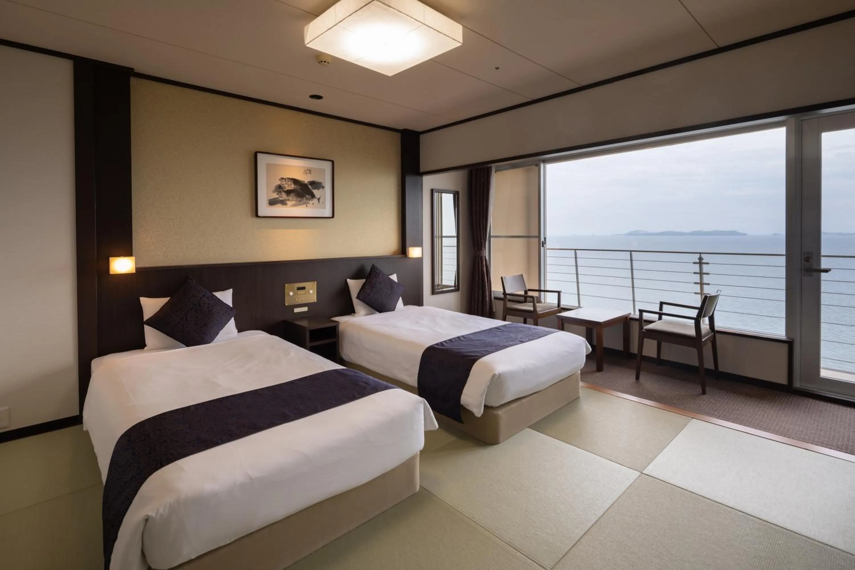 Photo of the whole room, Bed in KAMENOI HOTEL Ako