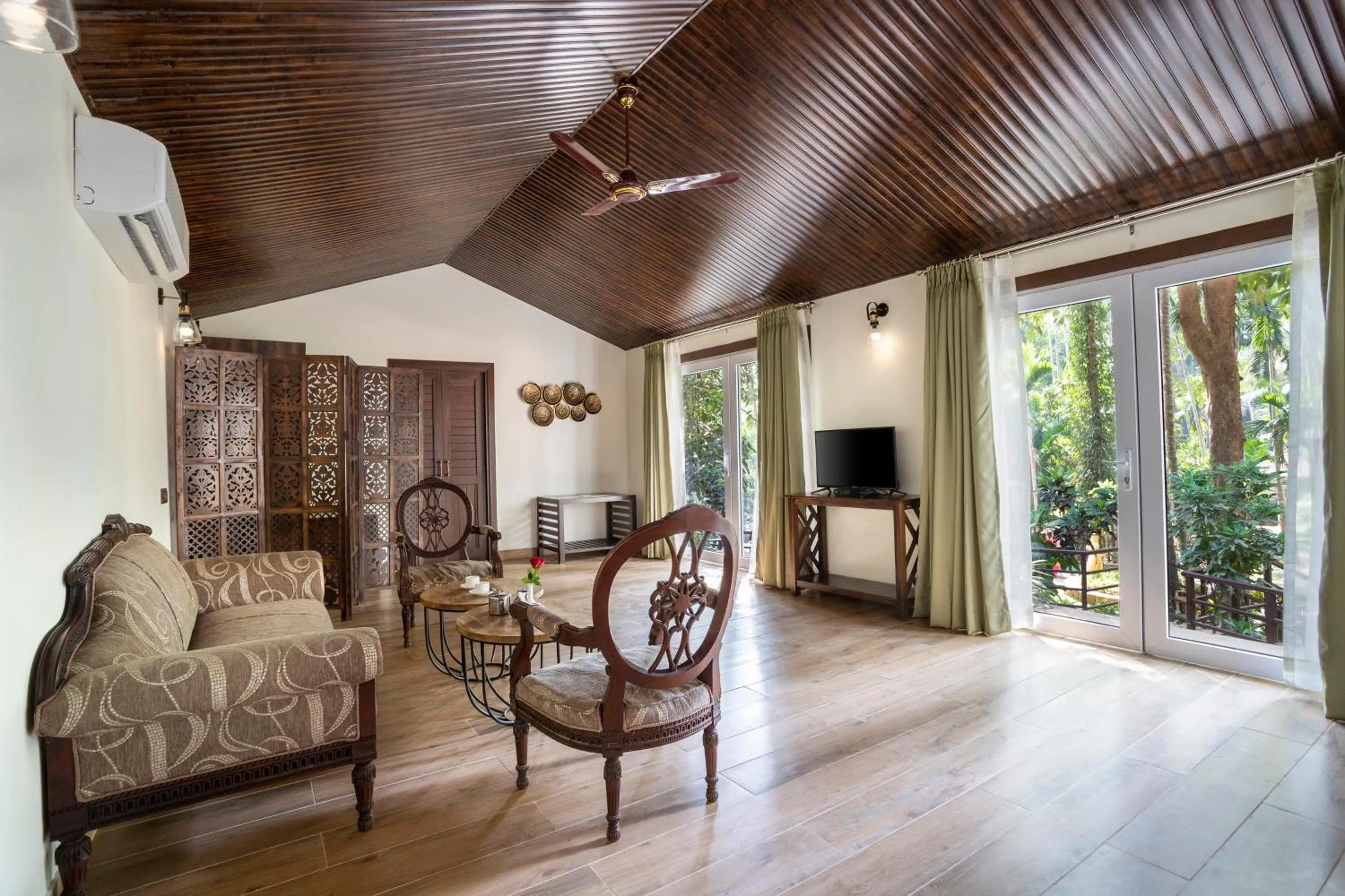 Seating area in Stone Wood Premier Gokarna