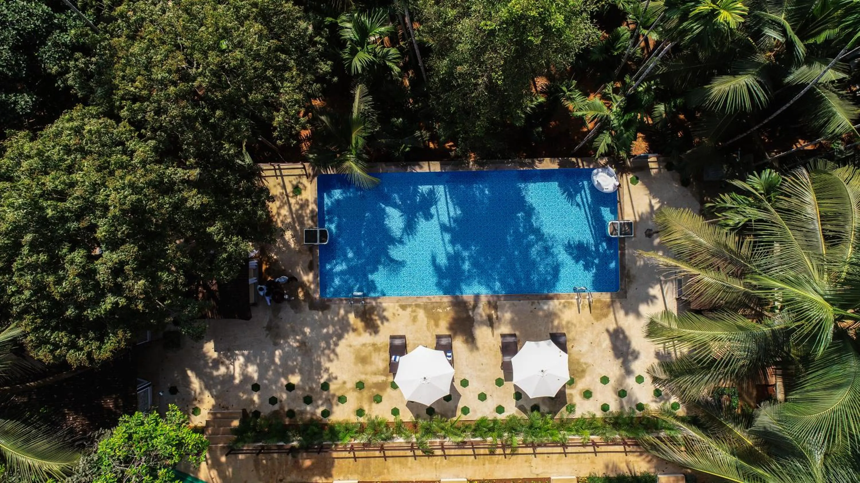 Swimming pool in Stone Wood Premier Gokarna