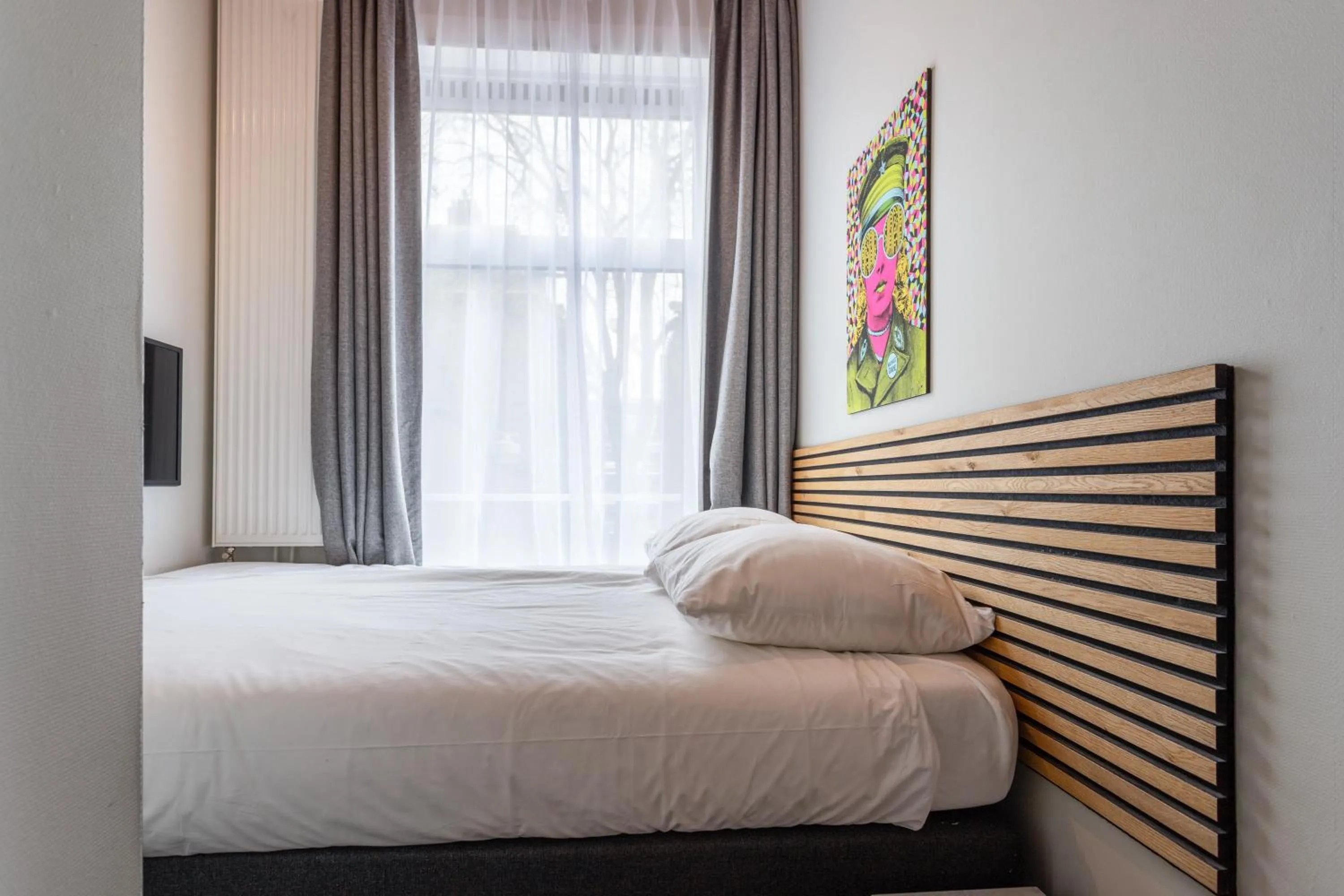 Bed in Weber Hotel 117