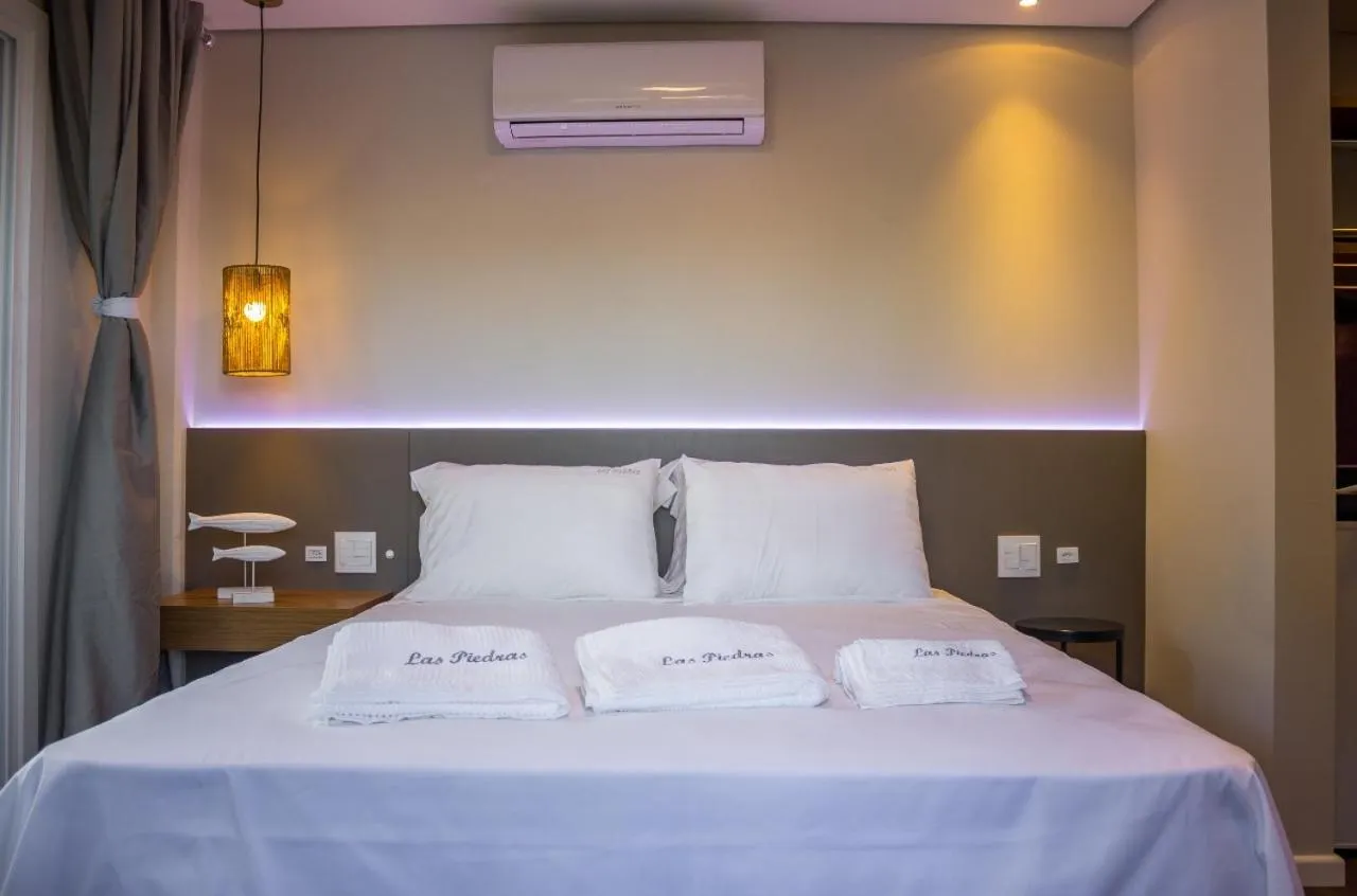 Bed in Pousada Las Piedras