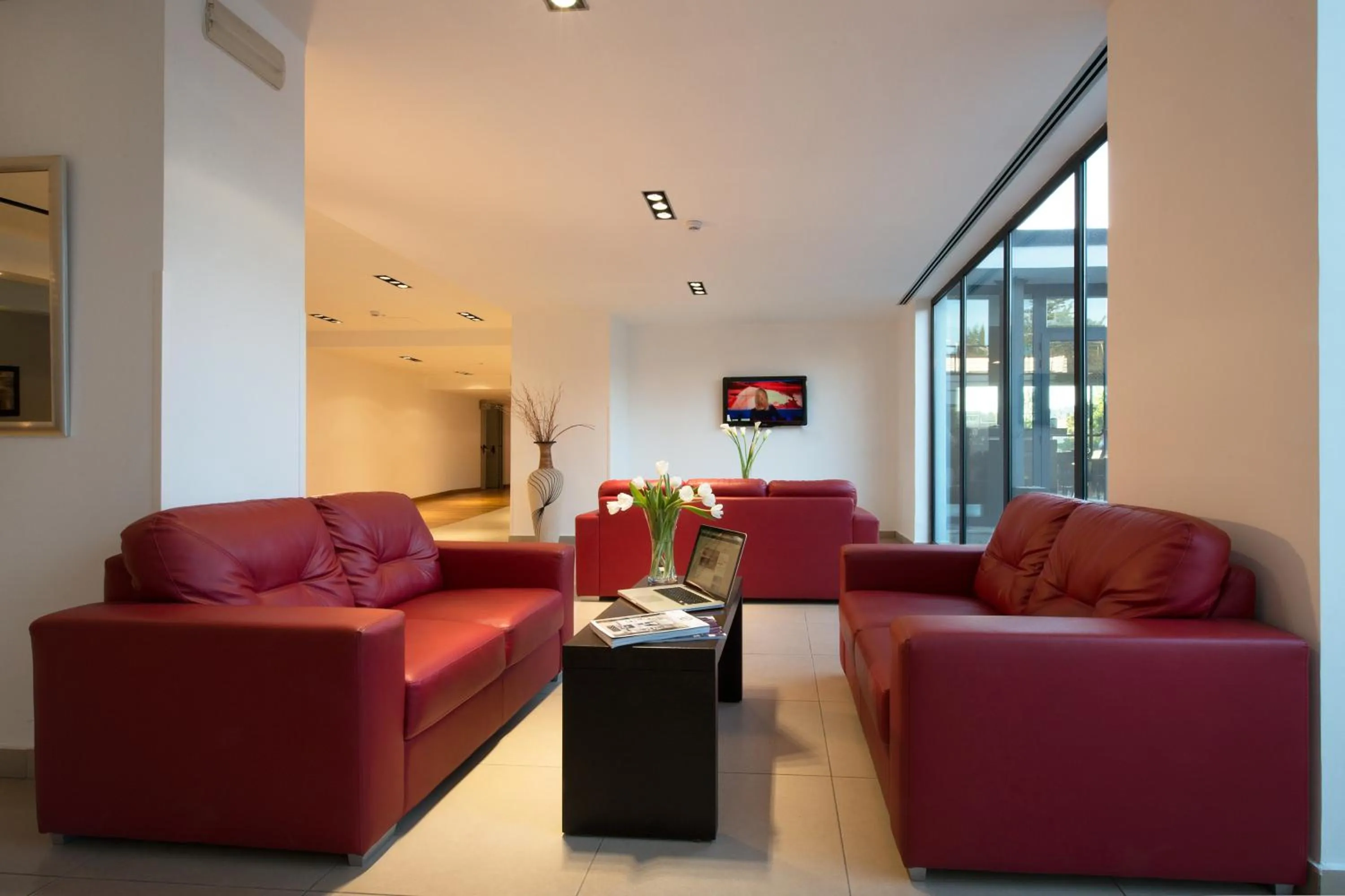 Lobby or reception in Garden Hotel