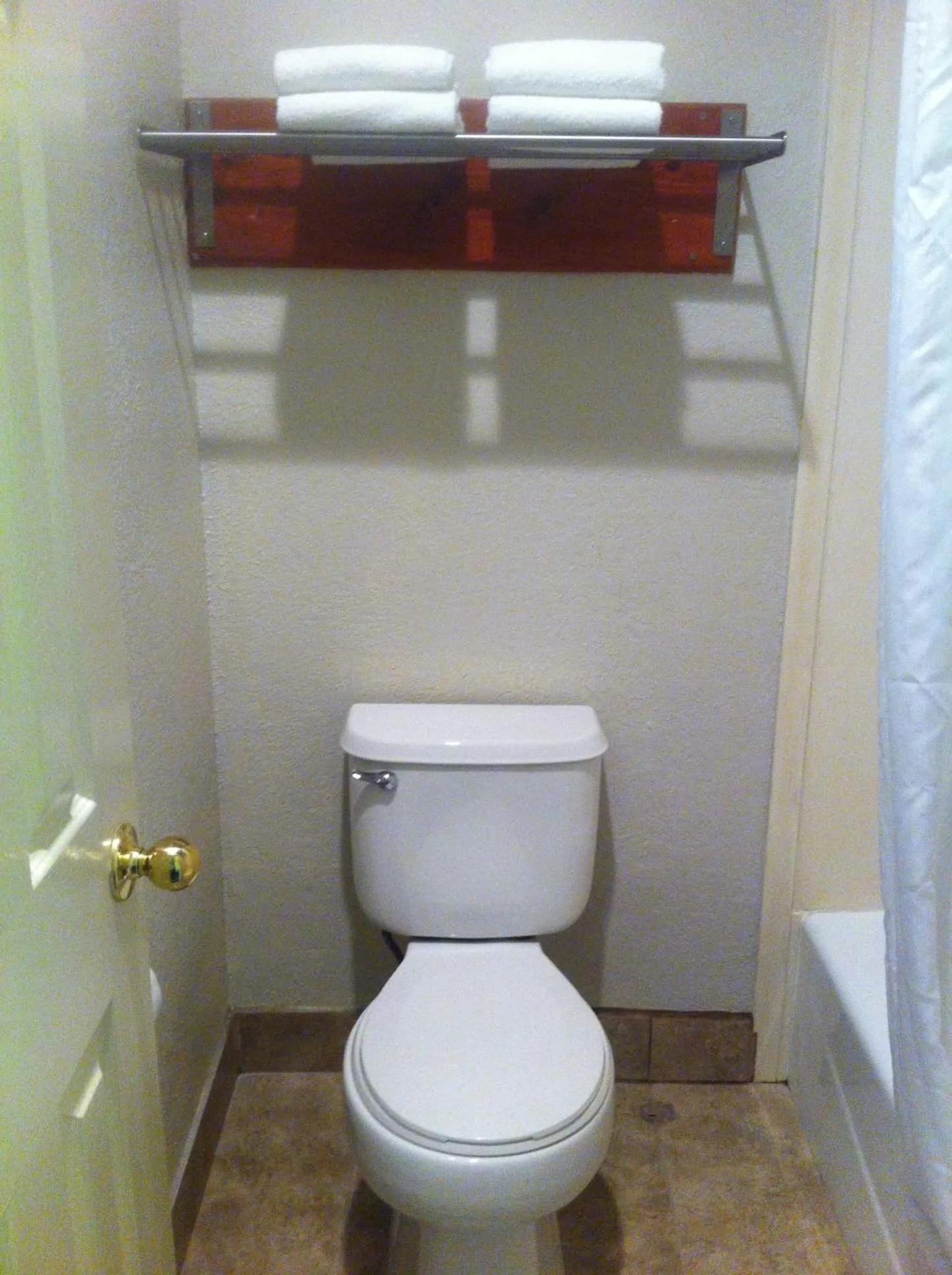 Toilet in Granada Inn