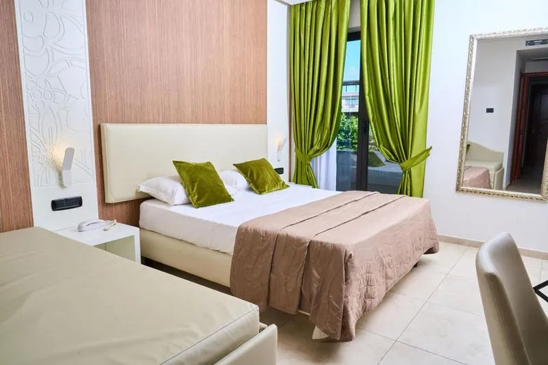 Bed in Hotel Miramare