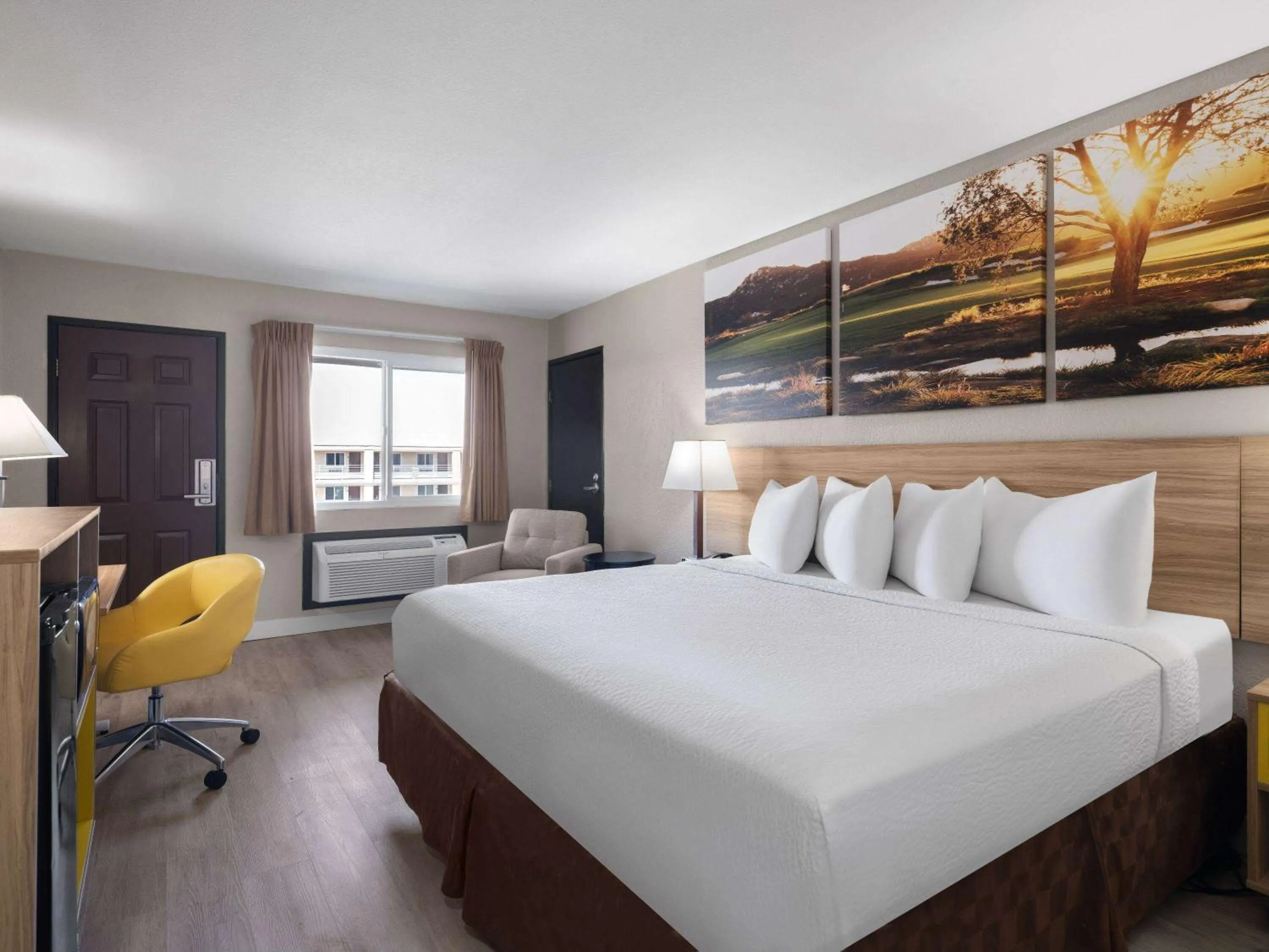 Photo of the whole room, Bed in Days Inn by Wyndham Las Vegas Airport Near the Strip