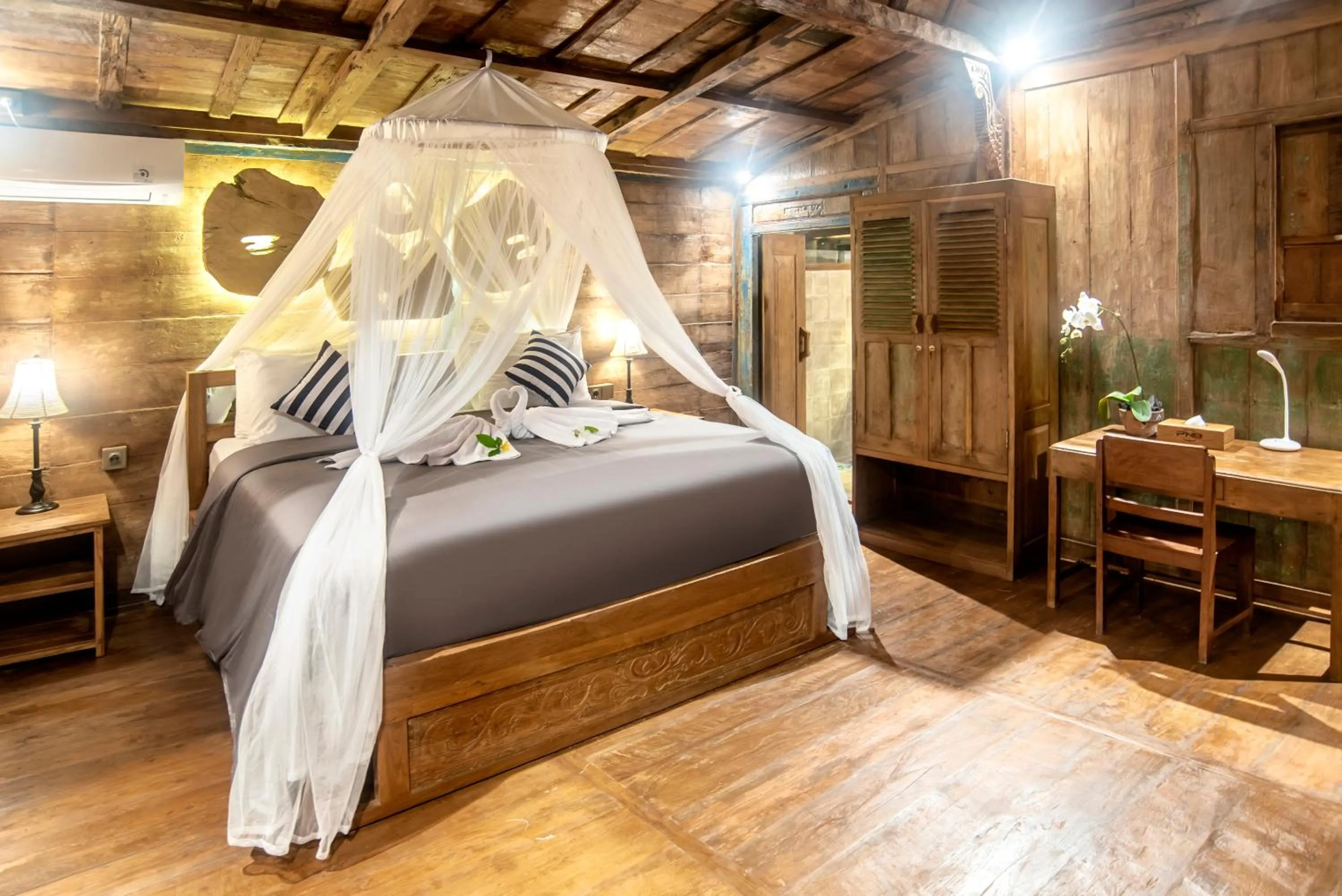 Bed in PNB Bali Villas