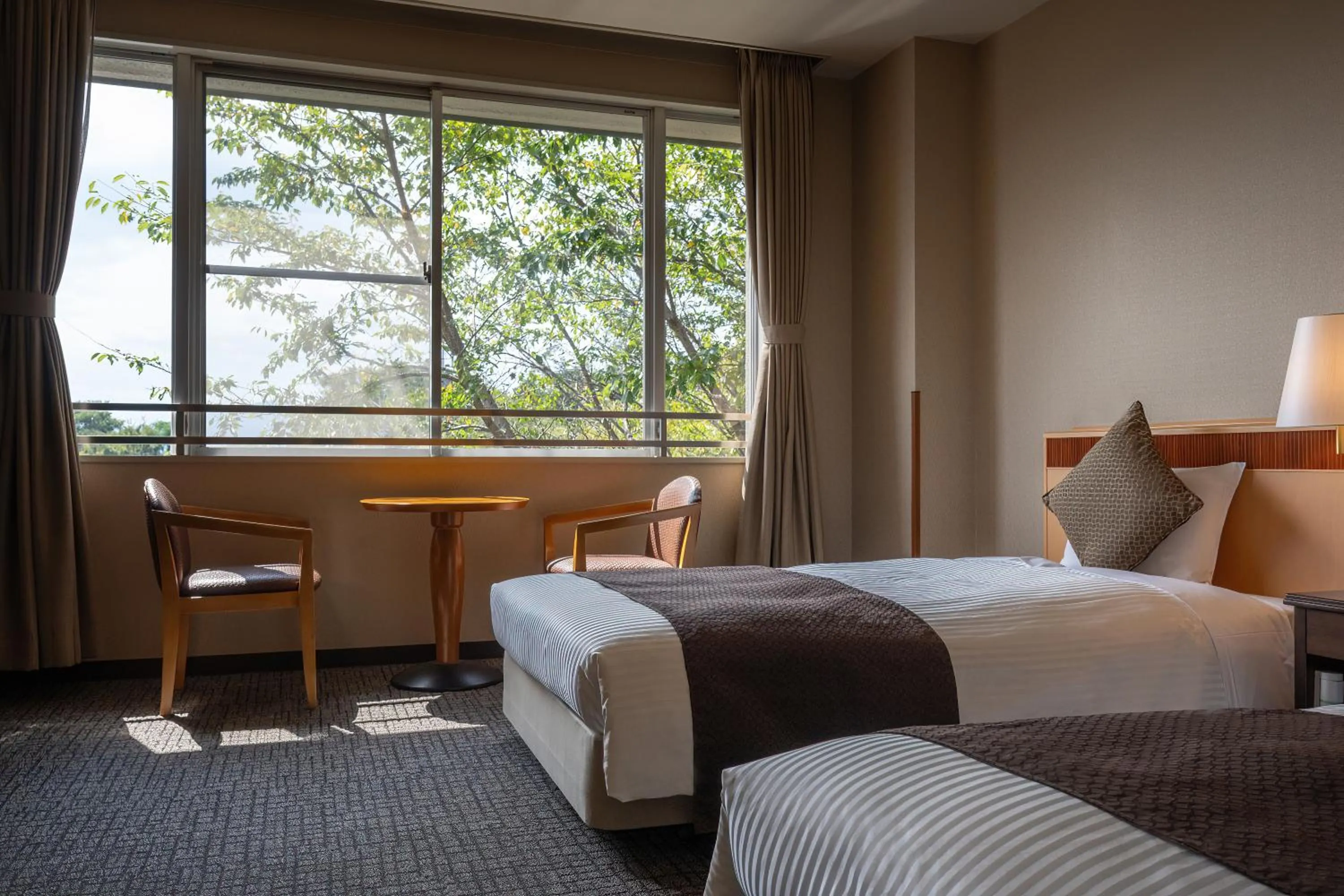 Bedroom, Bed in KAMENOI HOTEL Tondabayashi