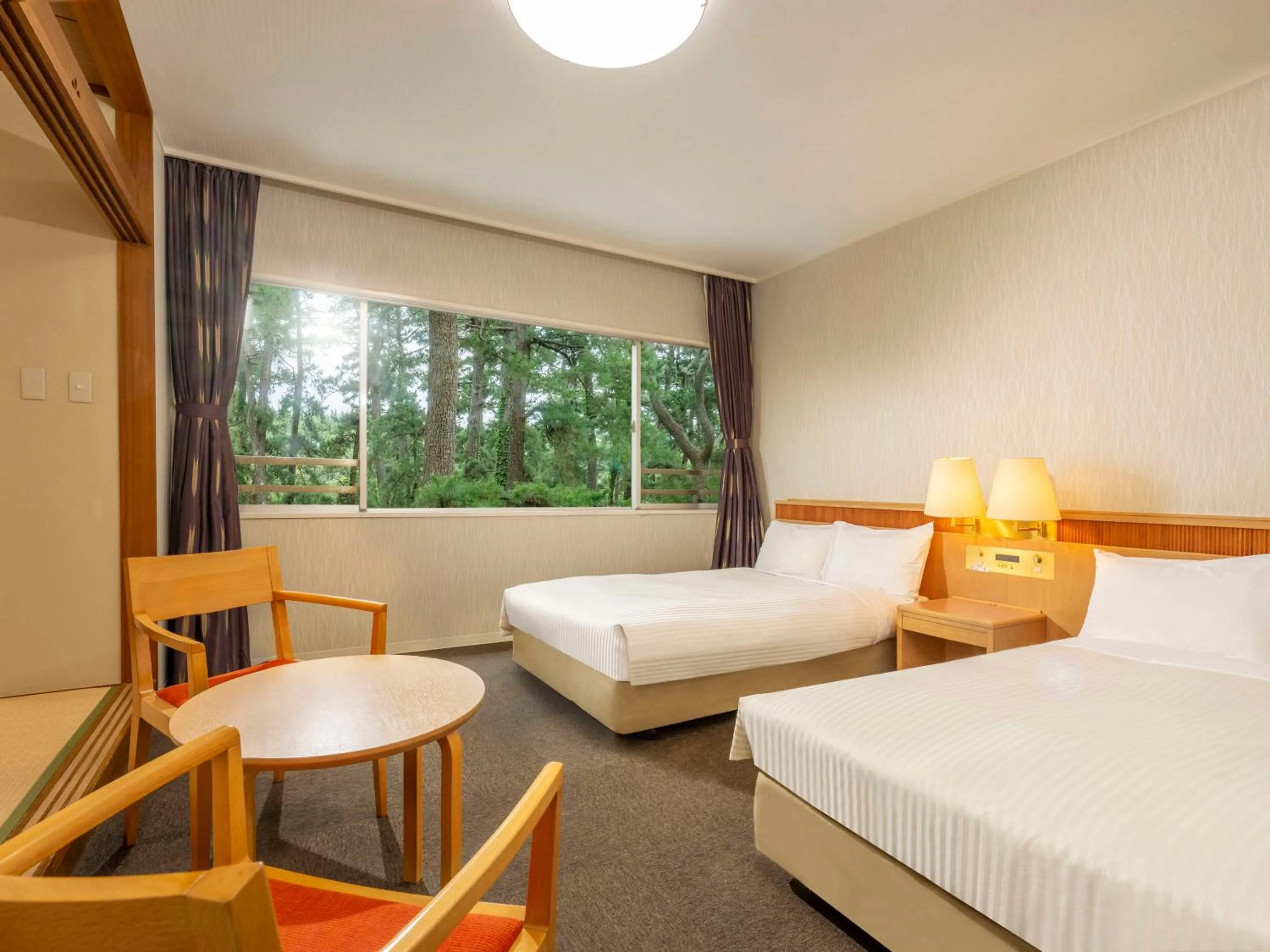 Photo of the whole room, Bed in KAMENOI HOTEL Kamogawa