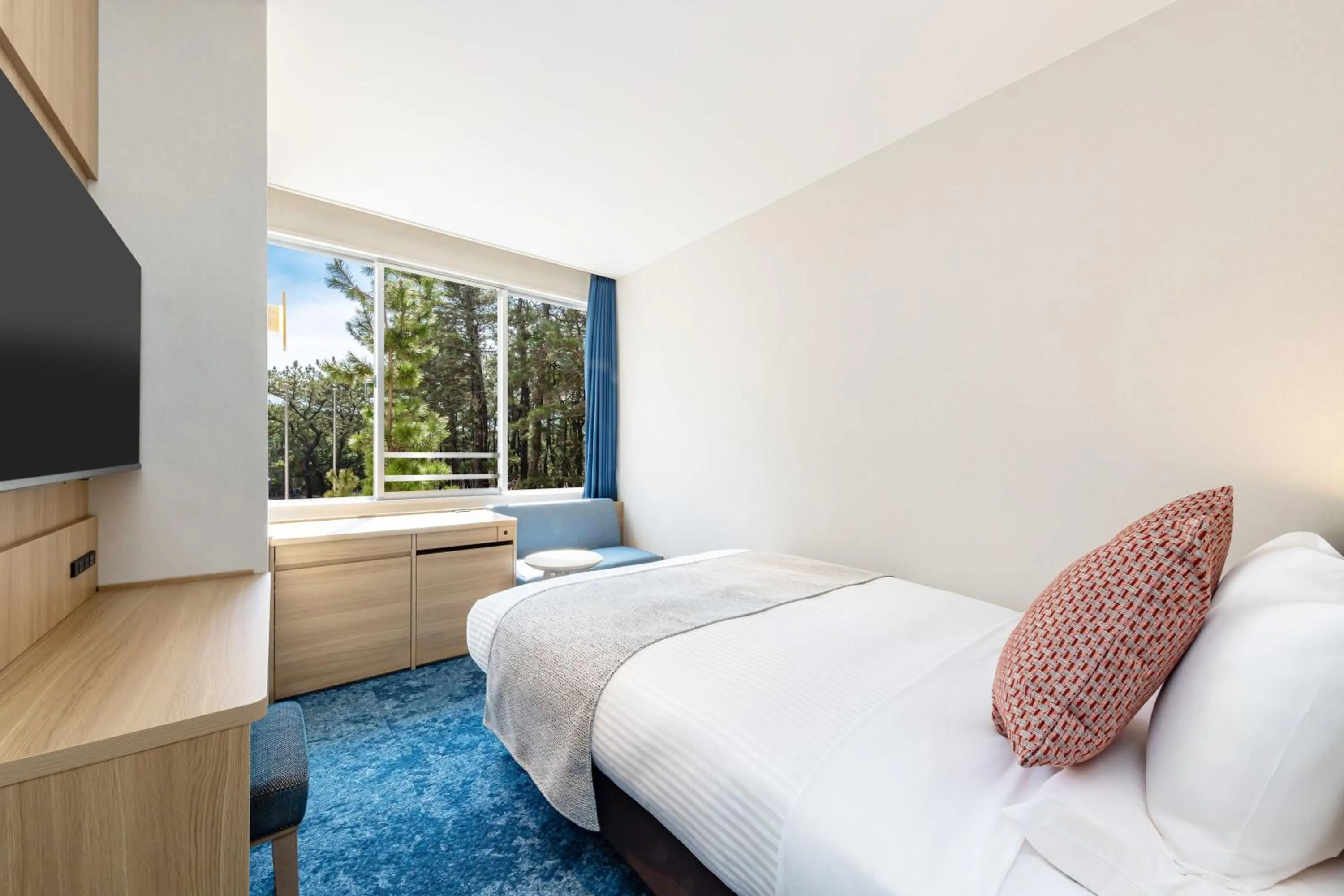 Bed in KAMENOI HOTEL Kamogawa