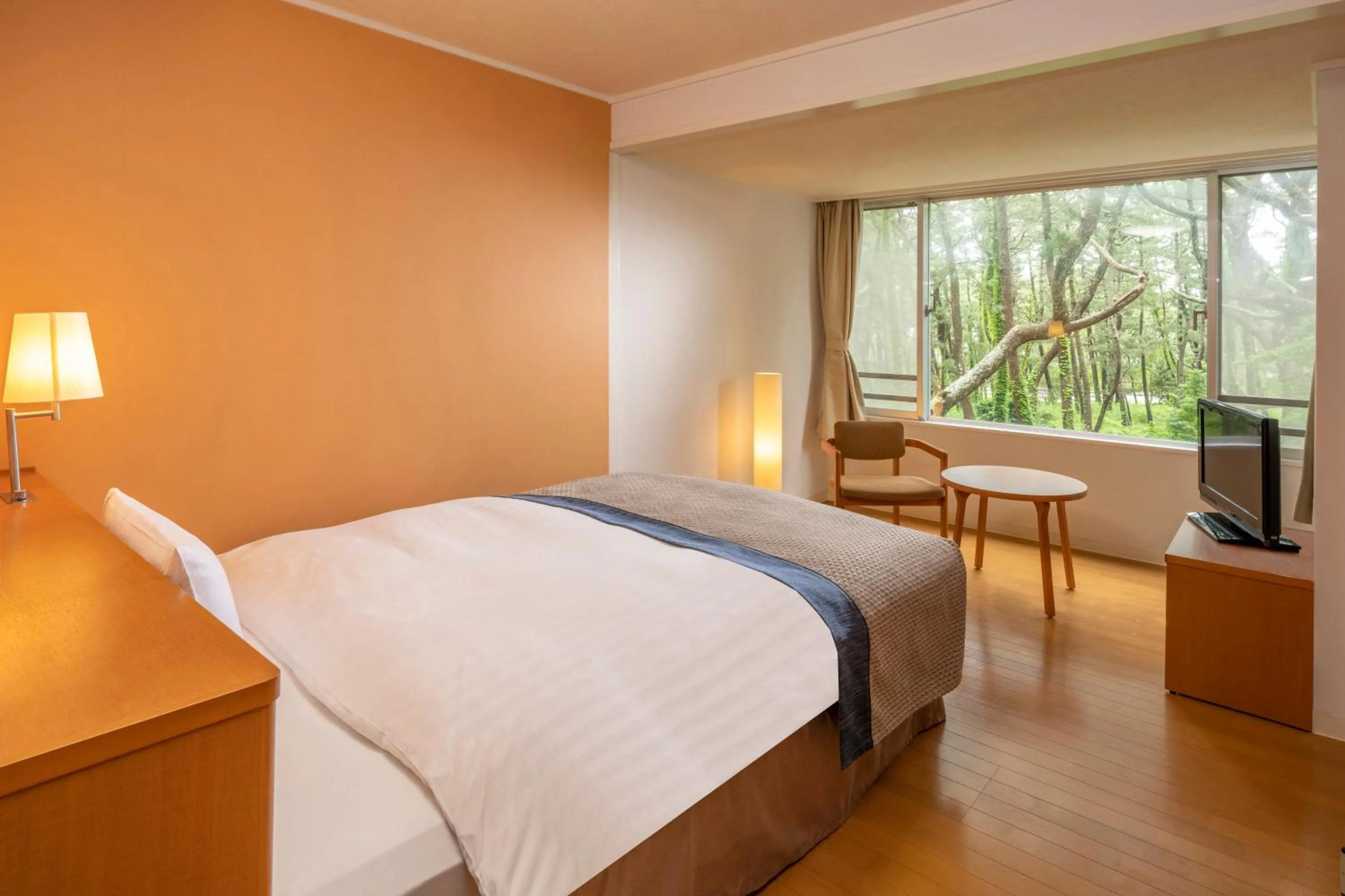 Photo of the whole room, Bed in KAMENOI HOTEL Kamogawa