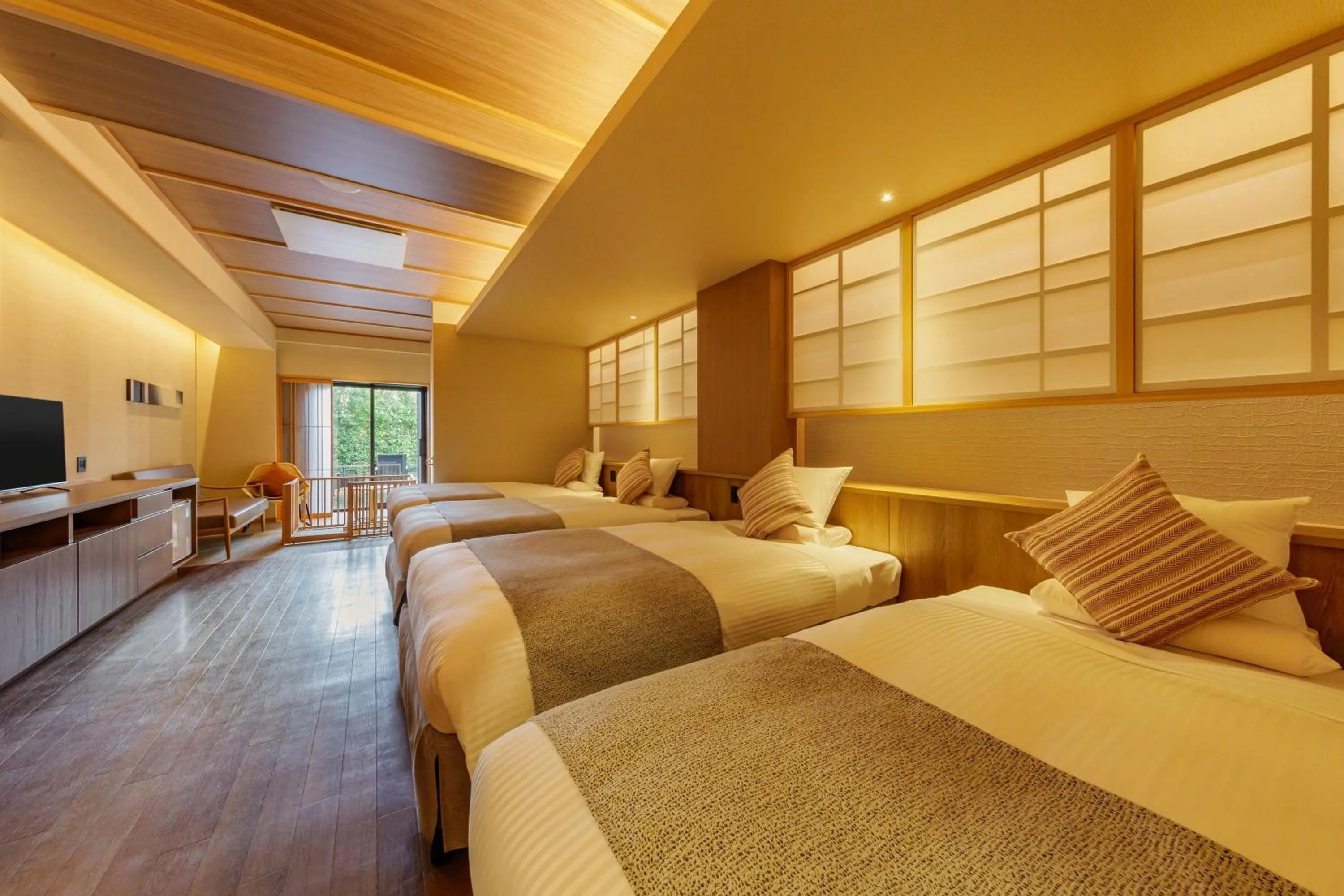 Bed in KAMENOI HOTEL Kamogawa