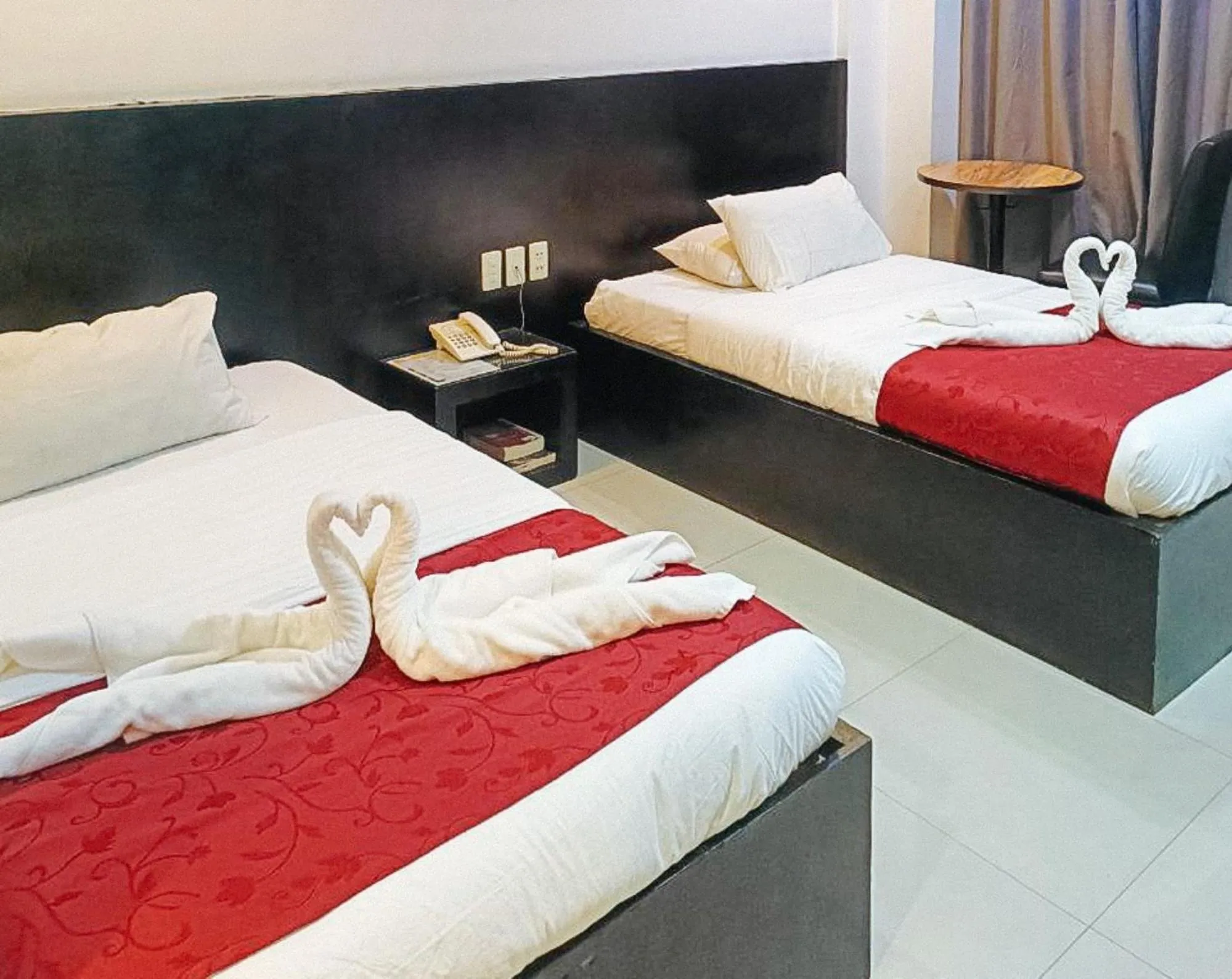 Bed in Check Inn Hotel Dumaguete City by RedDoorz