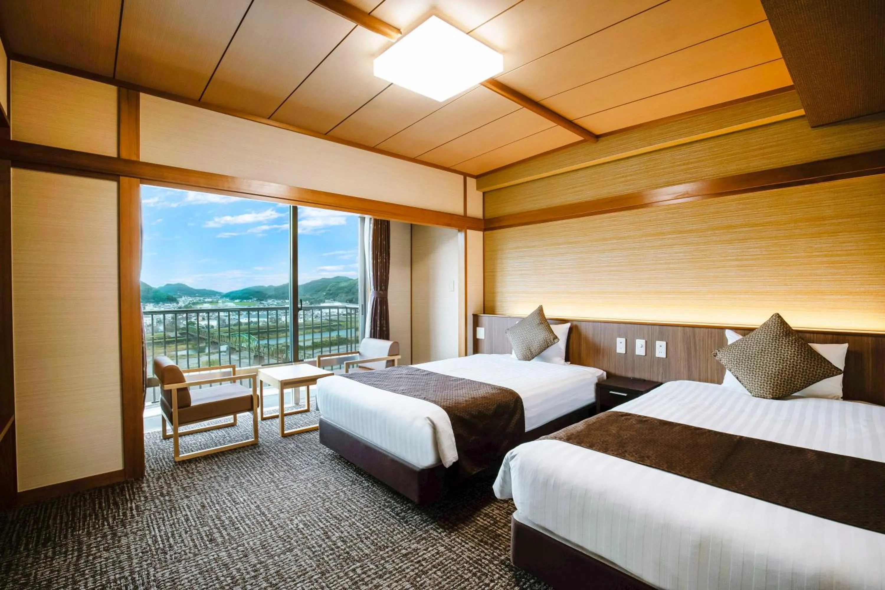 Photo of the whole room, Bed in KAMENOI HOTEL Kochi