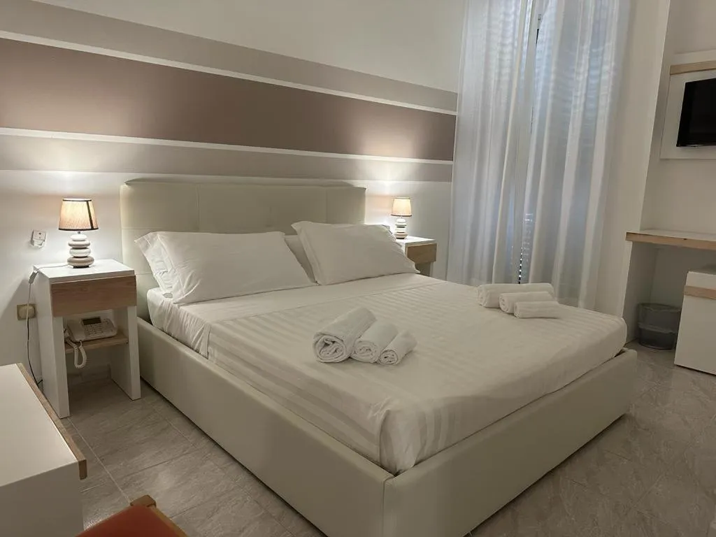 Bed in Porto Cesareo Hotel