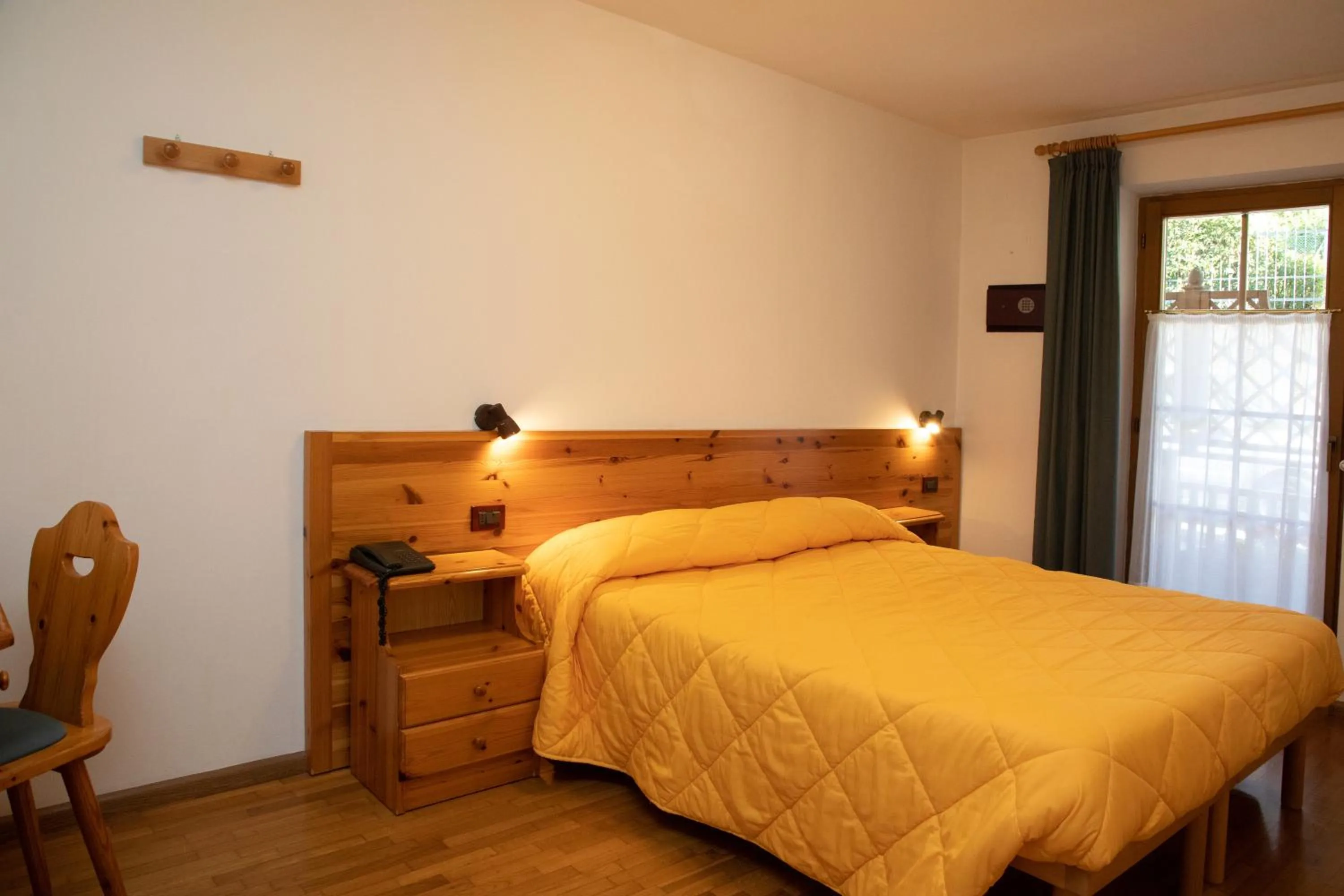 Photo of the whole room, Bed in Garni Manuela