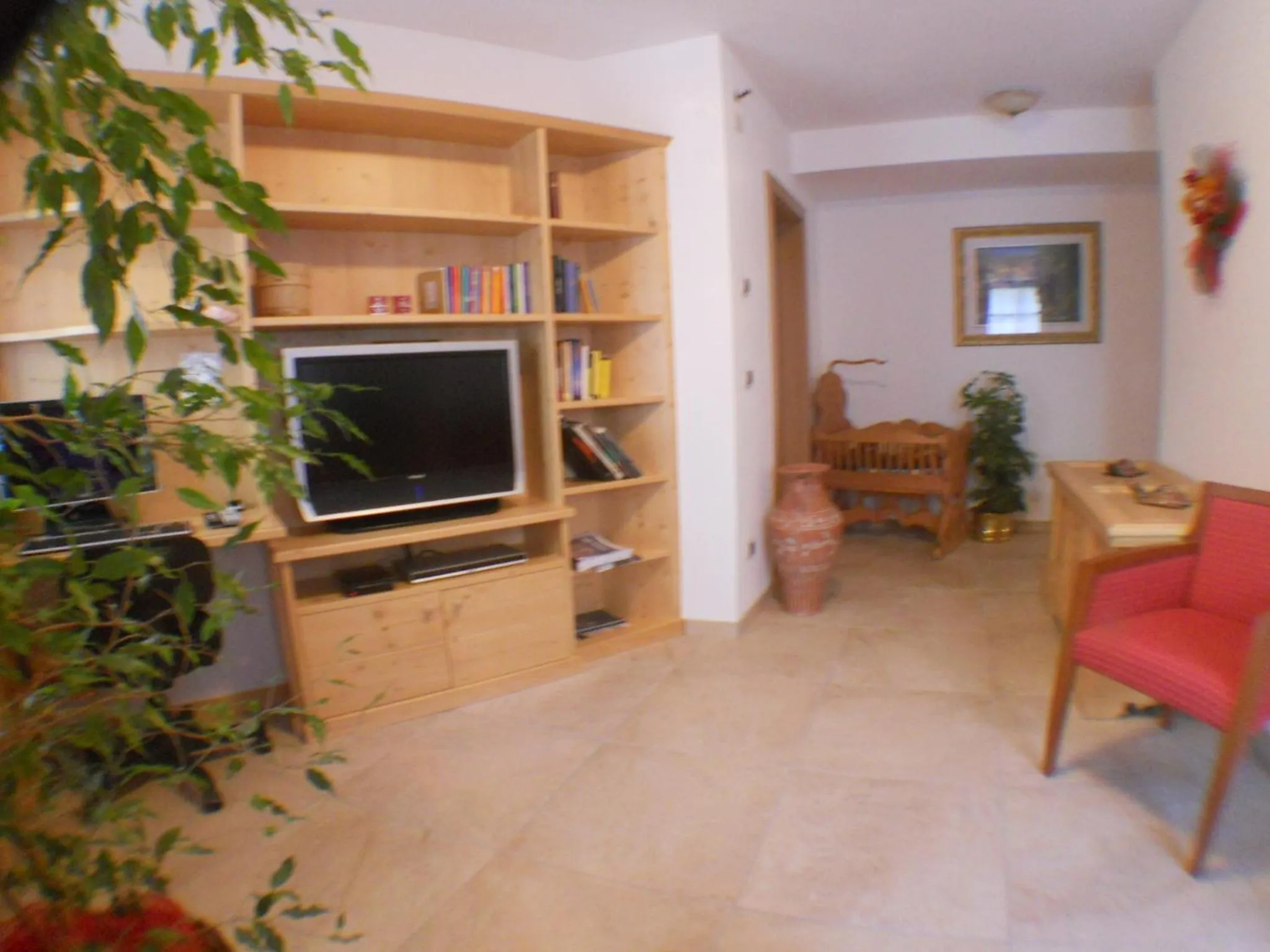 Communal lounge/ TV room in Garni Manuela