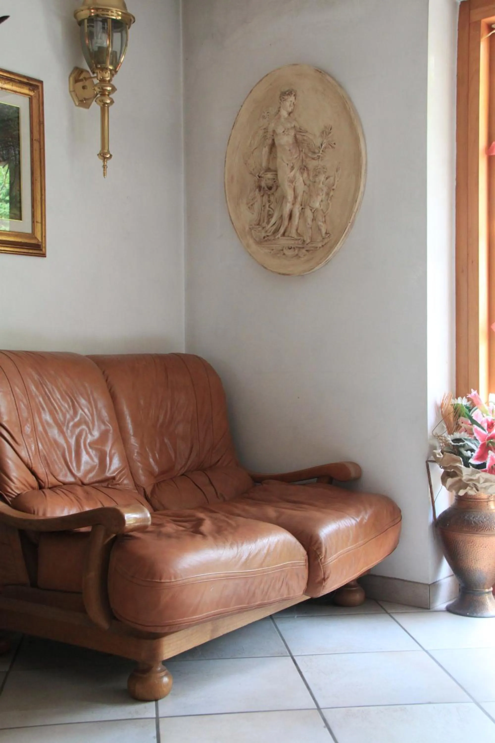 Seating area in Garnì Goccia d'Oro