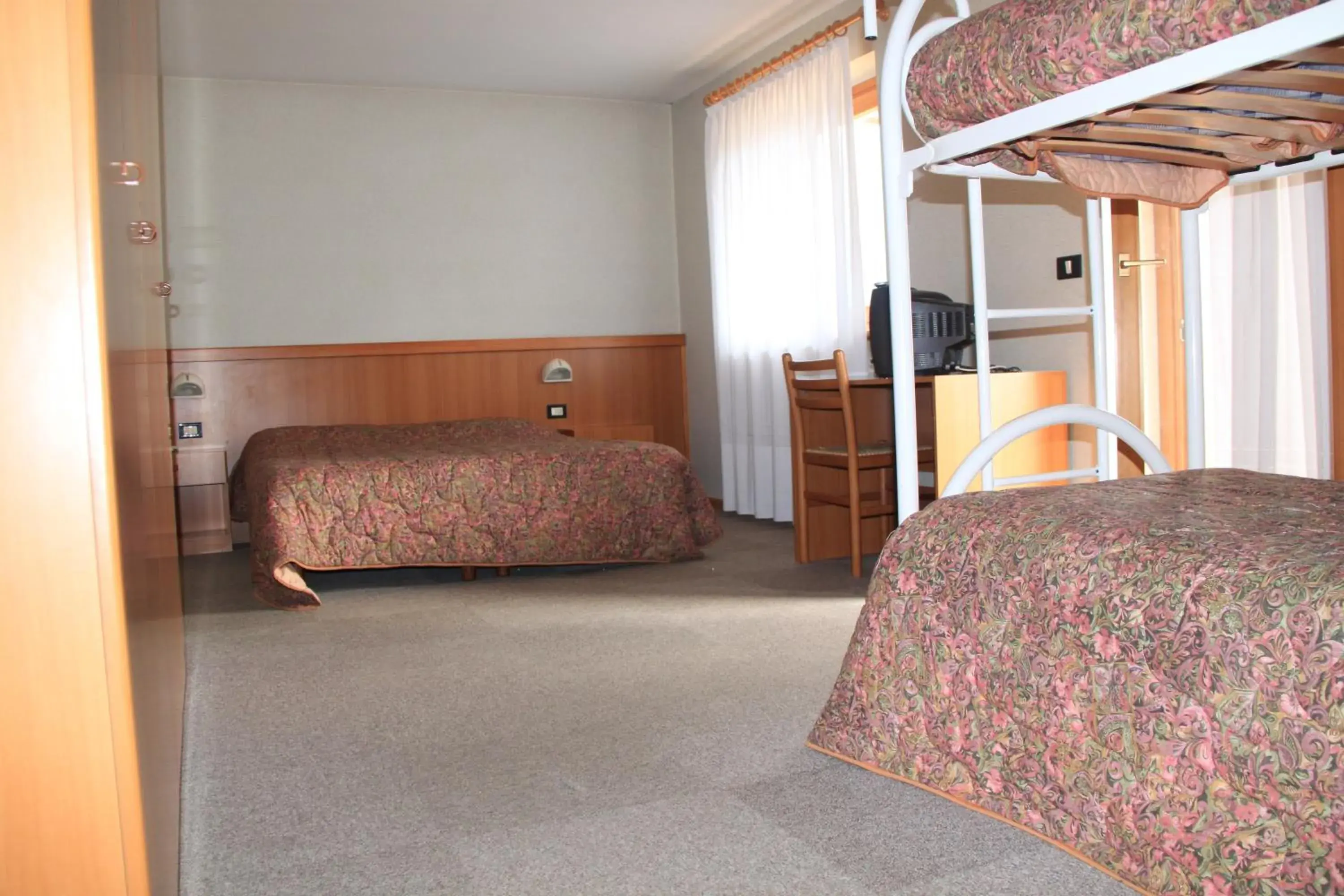 Triple Room in Garnì Goccia d'Oro Triple Room in Garnì Goccia d'Oro