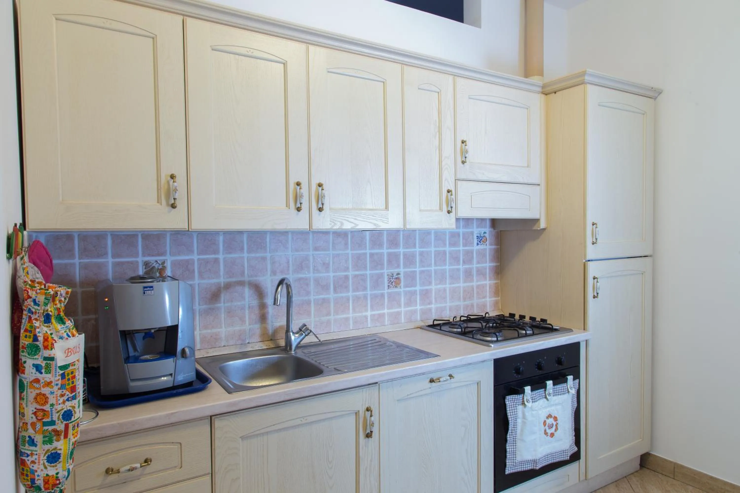 Kitchen or kitchenette in B&B Casa Cavour