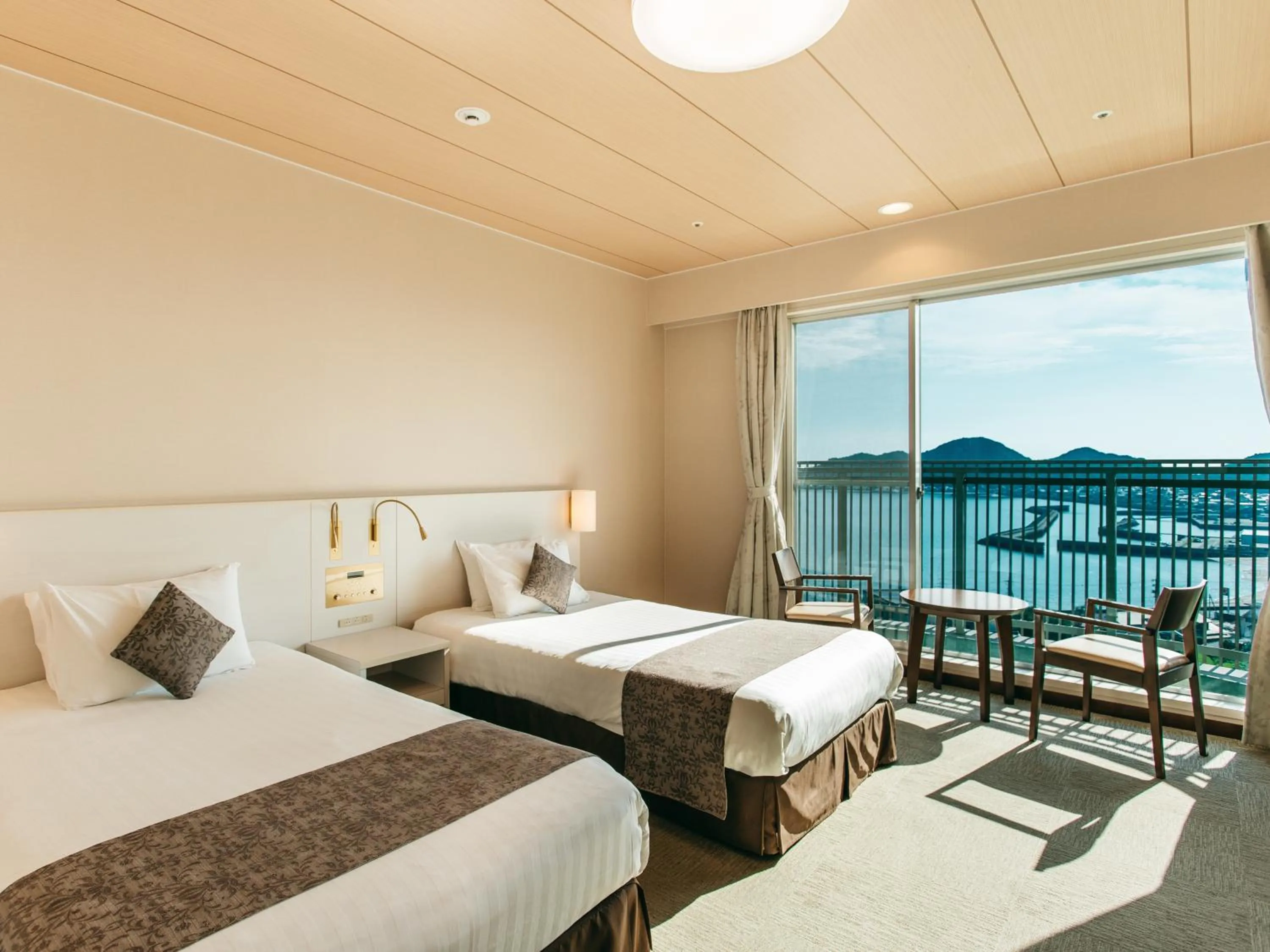 Photo of the whole room, Bed in KAMENOI HOTEL Setouchi Hikari