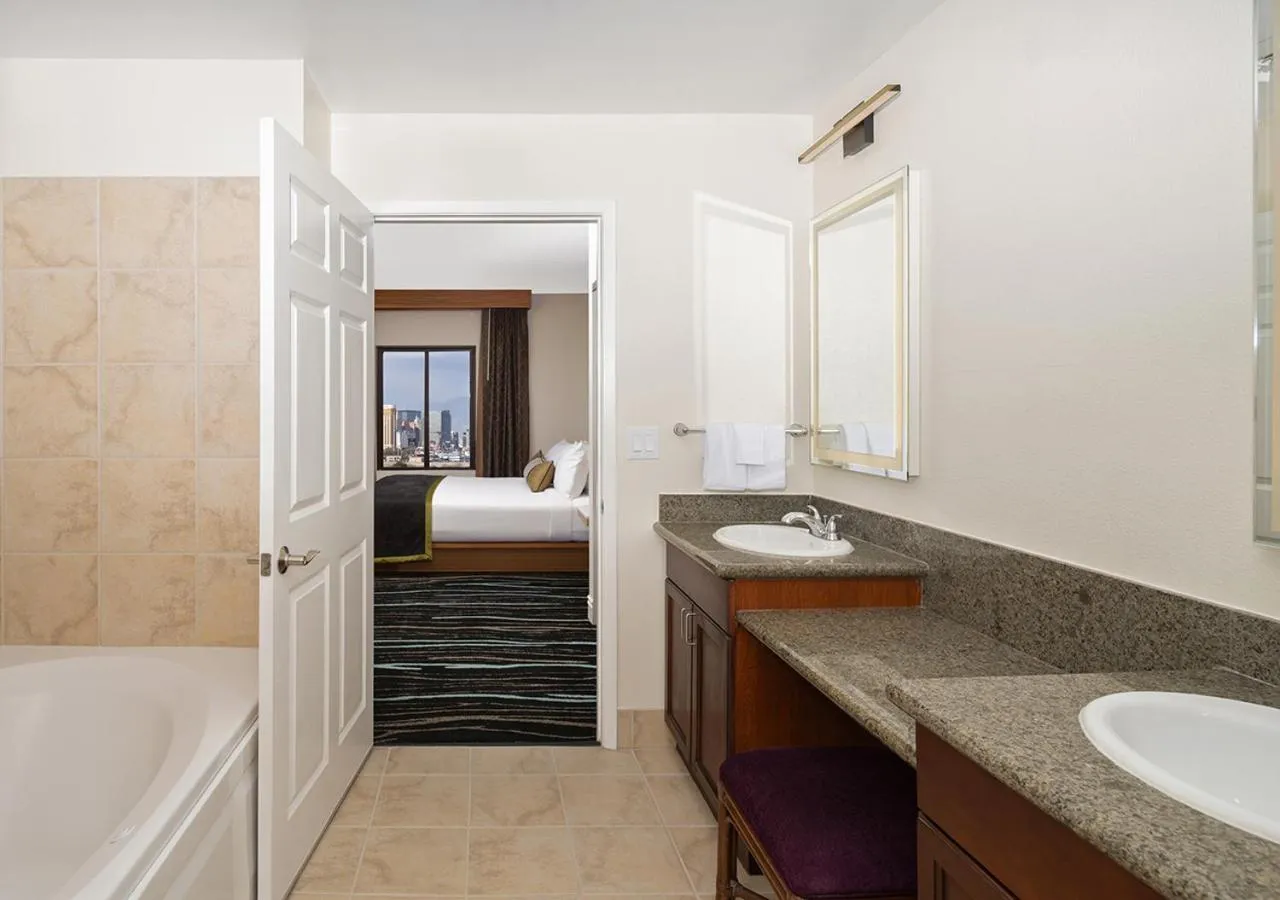 Bathroom, Bed in Tahiti Village Resort & Spa