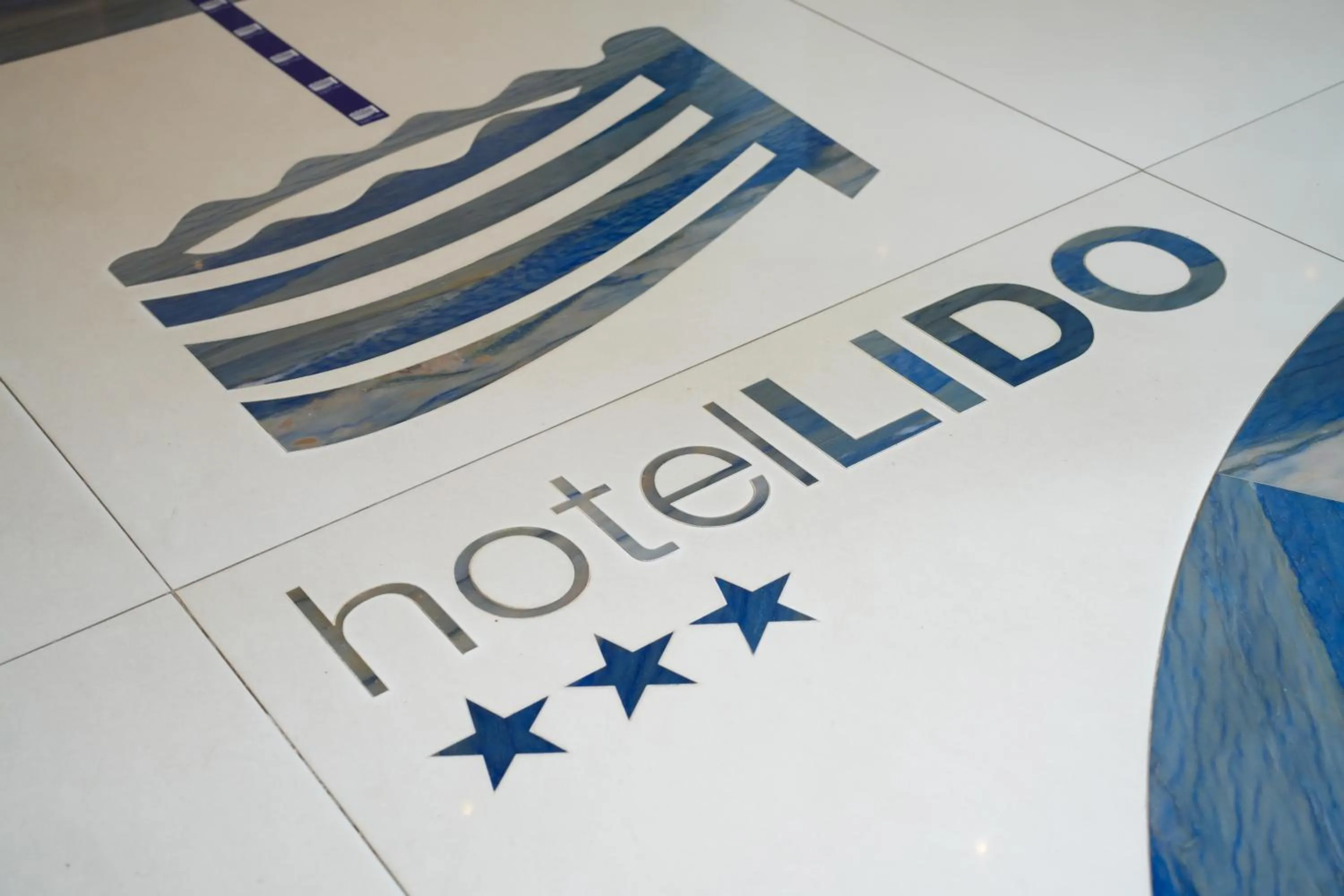 Property logo or sign in Hotel Lido