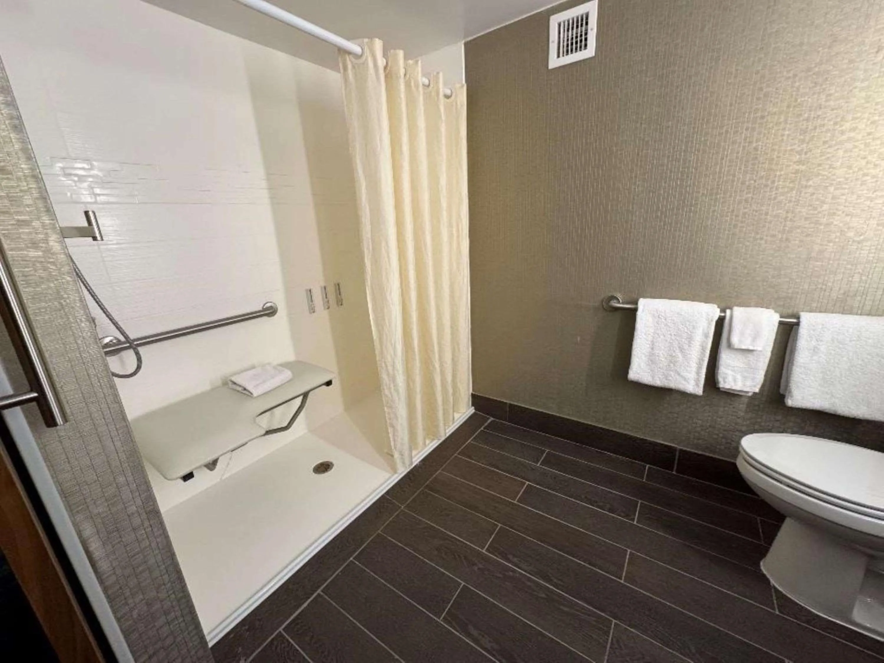 Bathroom in Skyline Hotel Detroit Airport, SureStay Collection by Best Western