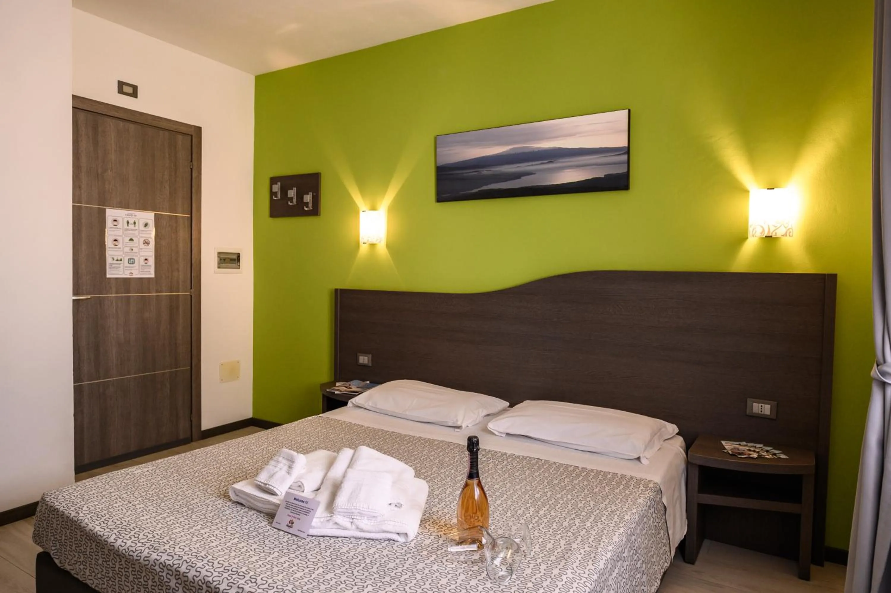 Bed in Hotel Rainbow Resort