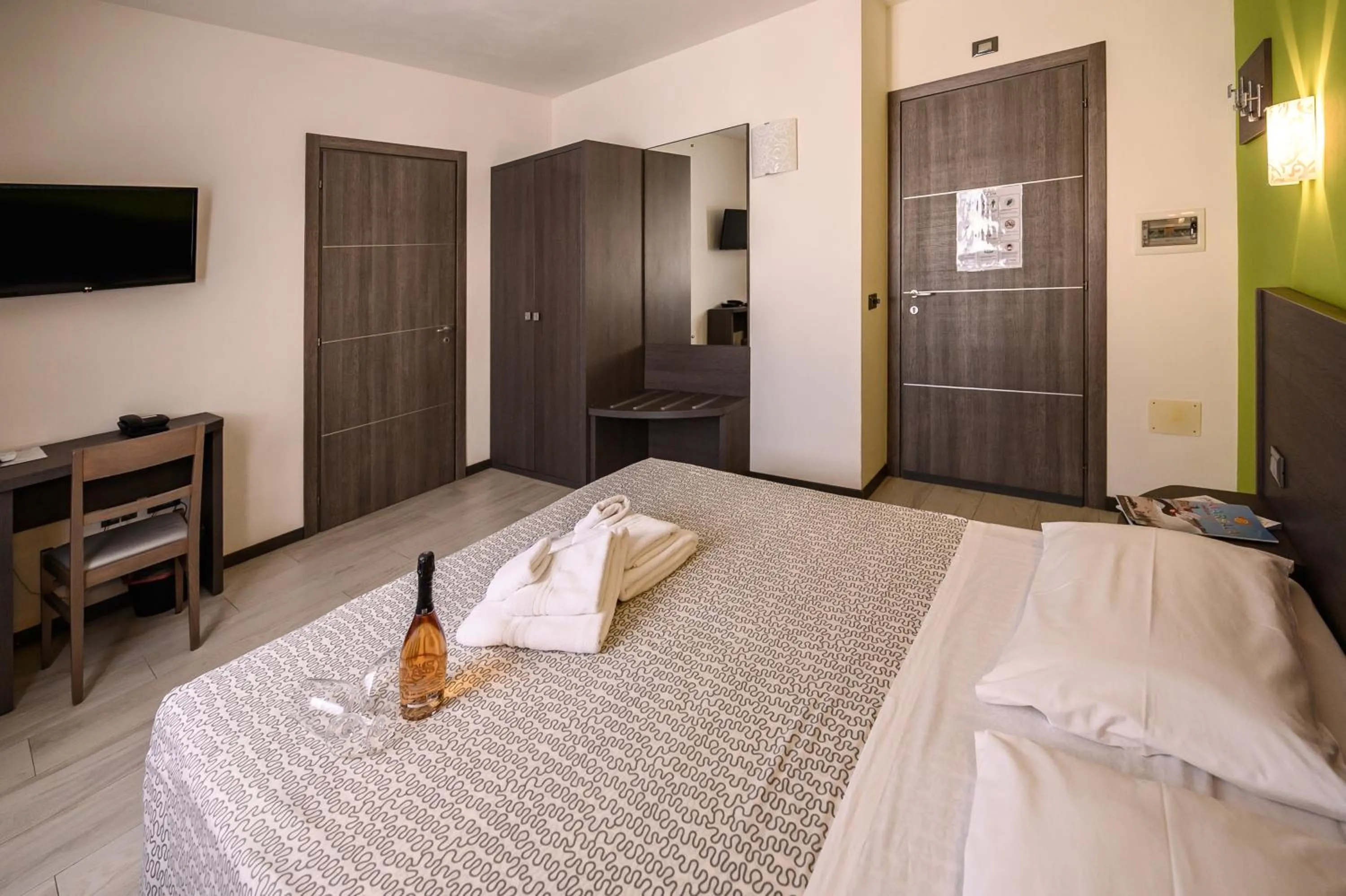 Bed in Hotel Rainbow Resort