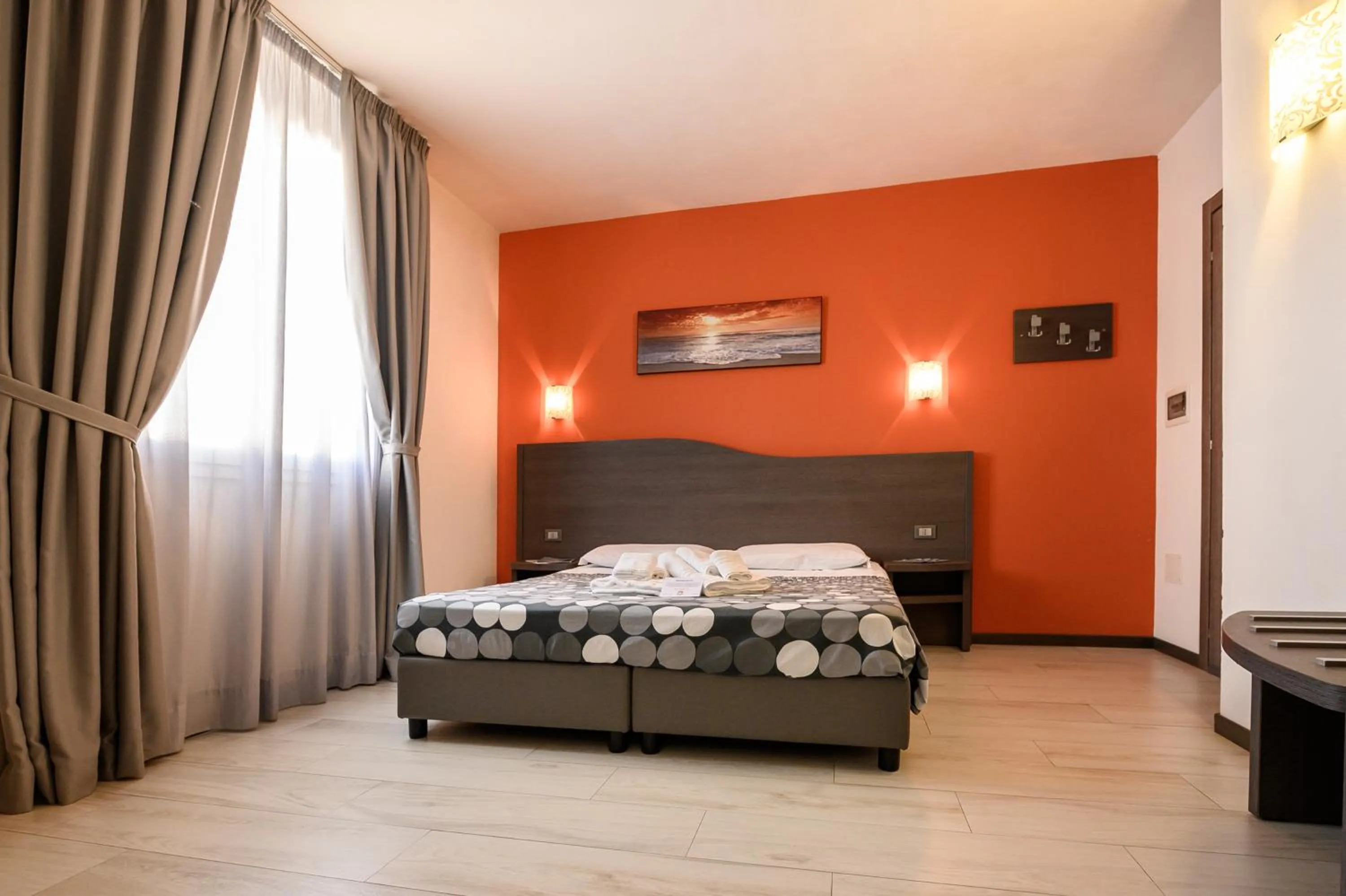 Bed in Hotel Rainbow Resort