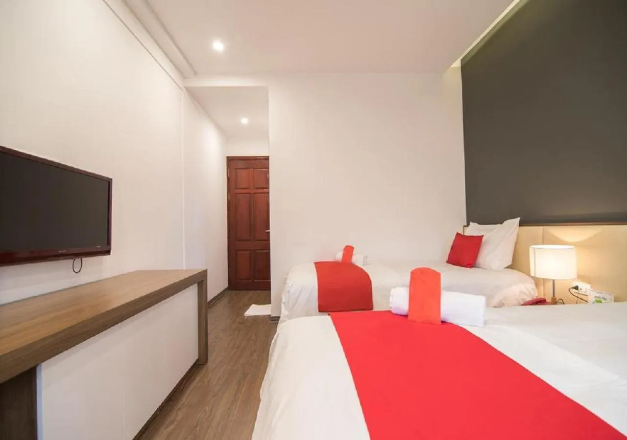 Bedroom in QUEEN'S Hotel