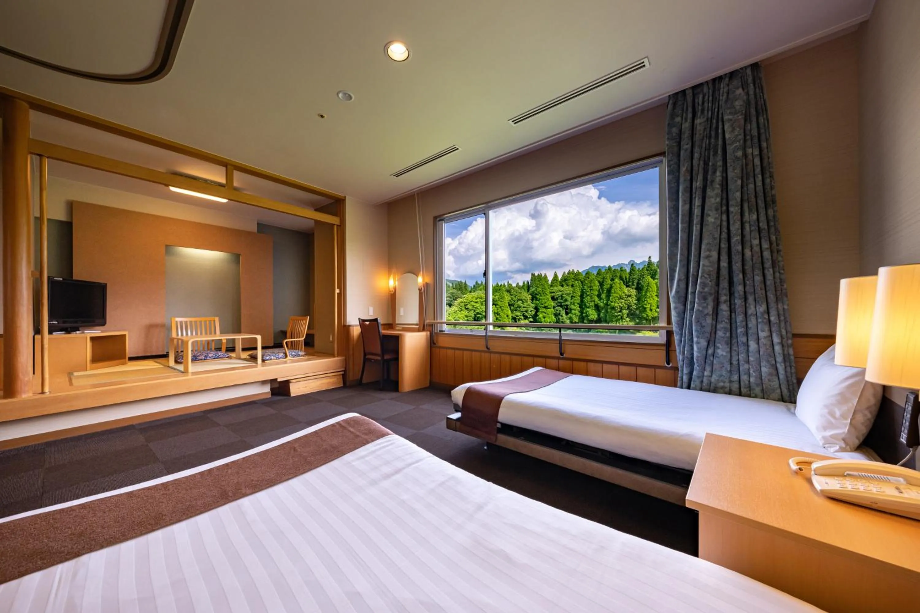 Photo of the whole room, Bed in KAMENOI HOTEL Aso