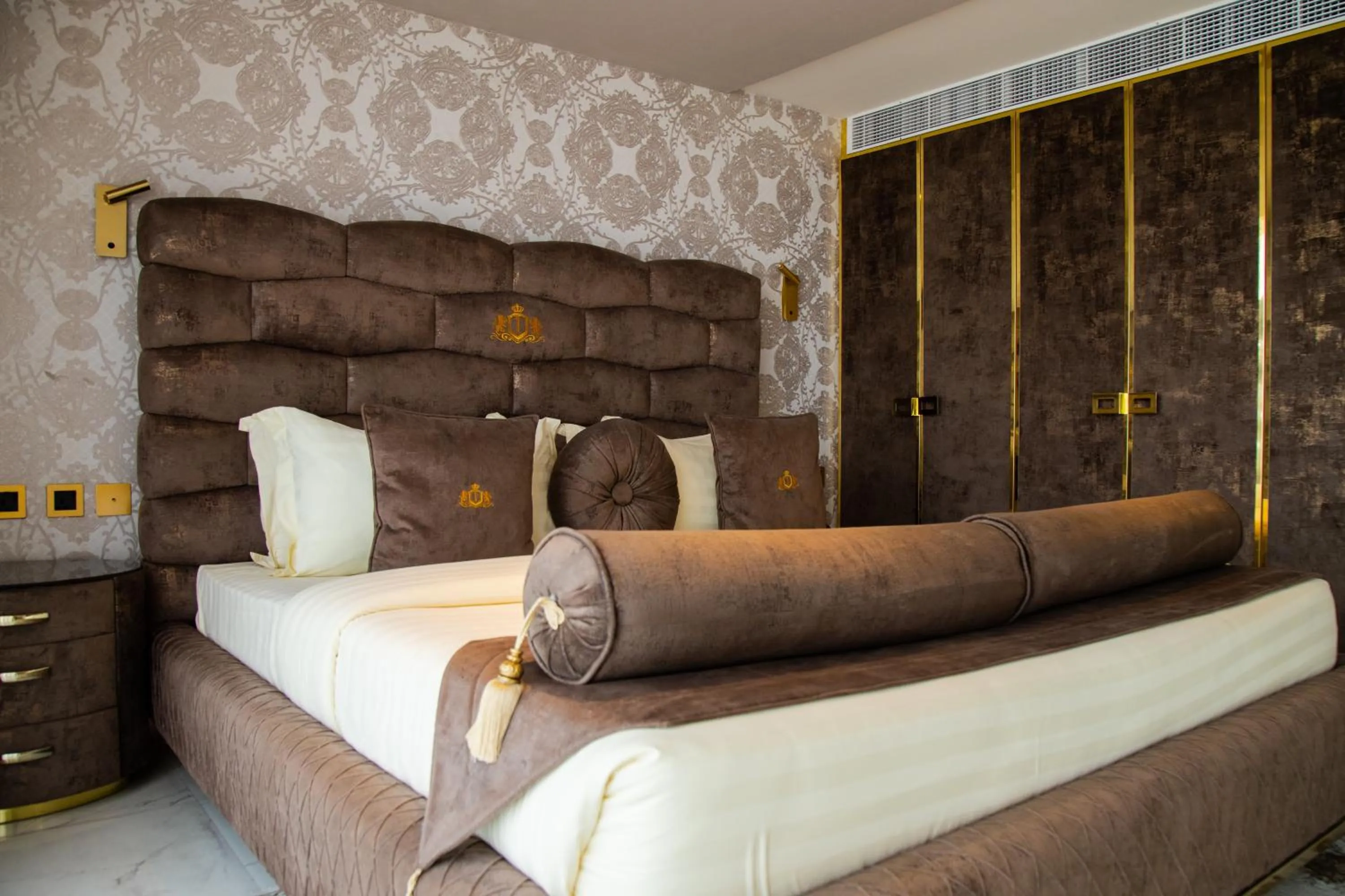 Bed in Number One Oxford Street Hotel & Suites