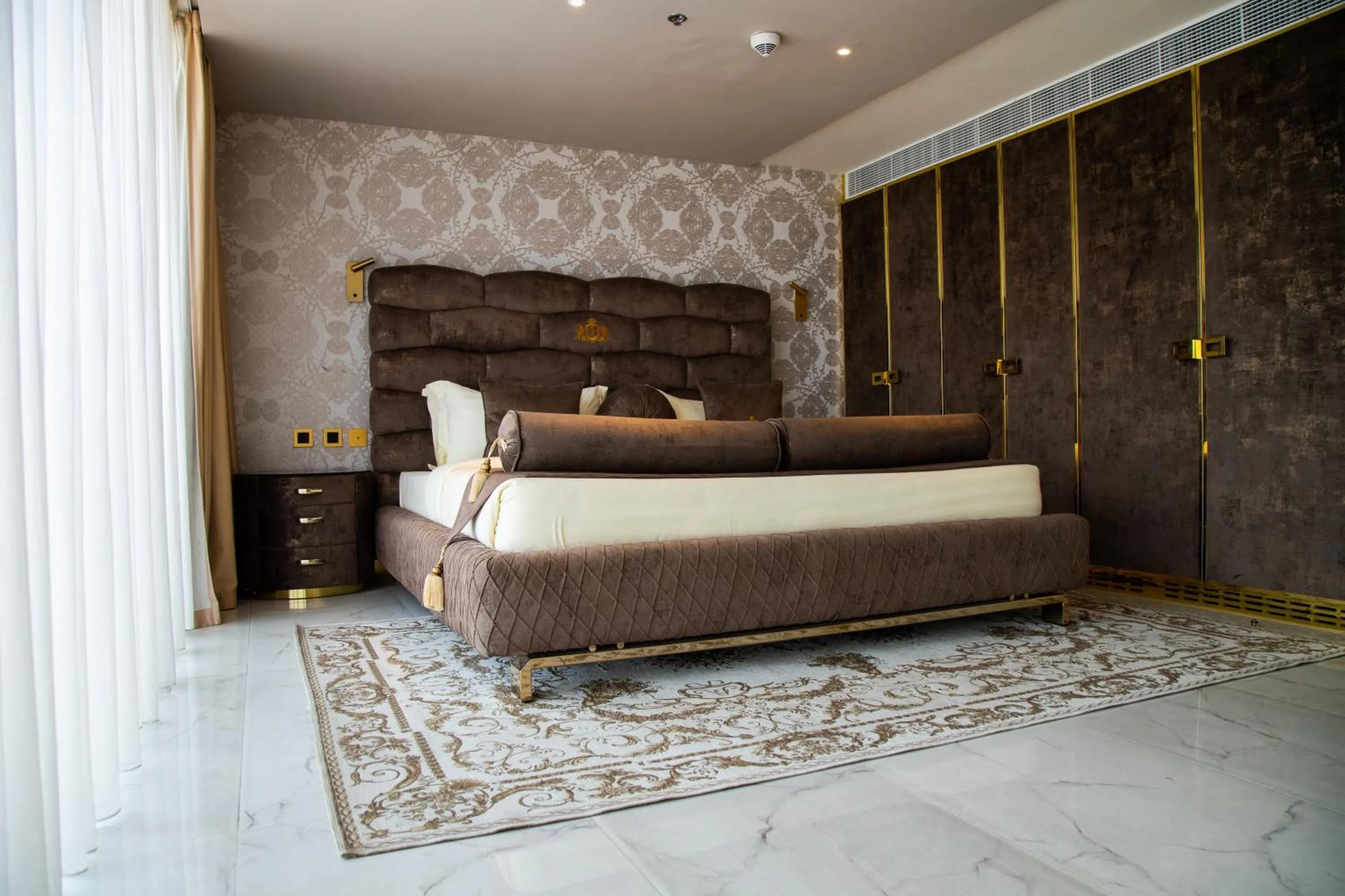 Bed in Number One Oxford Street Hotel & Suites