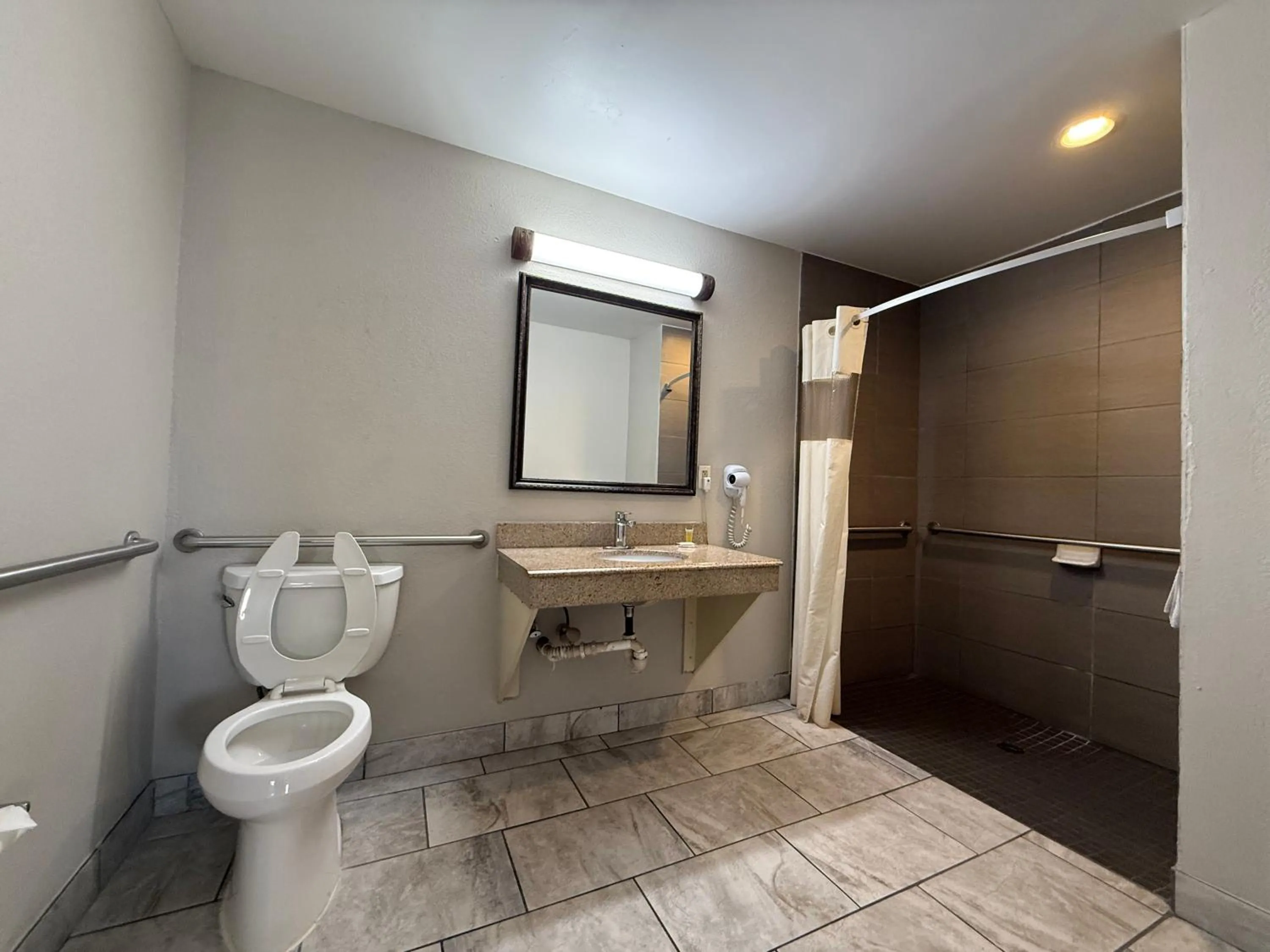 Bathroom in Days Inn by Wyndham San Antonio Interstate Hwy 35 North