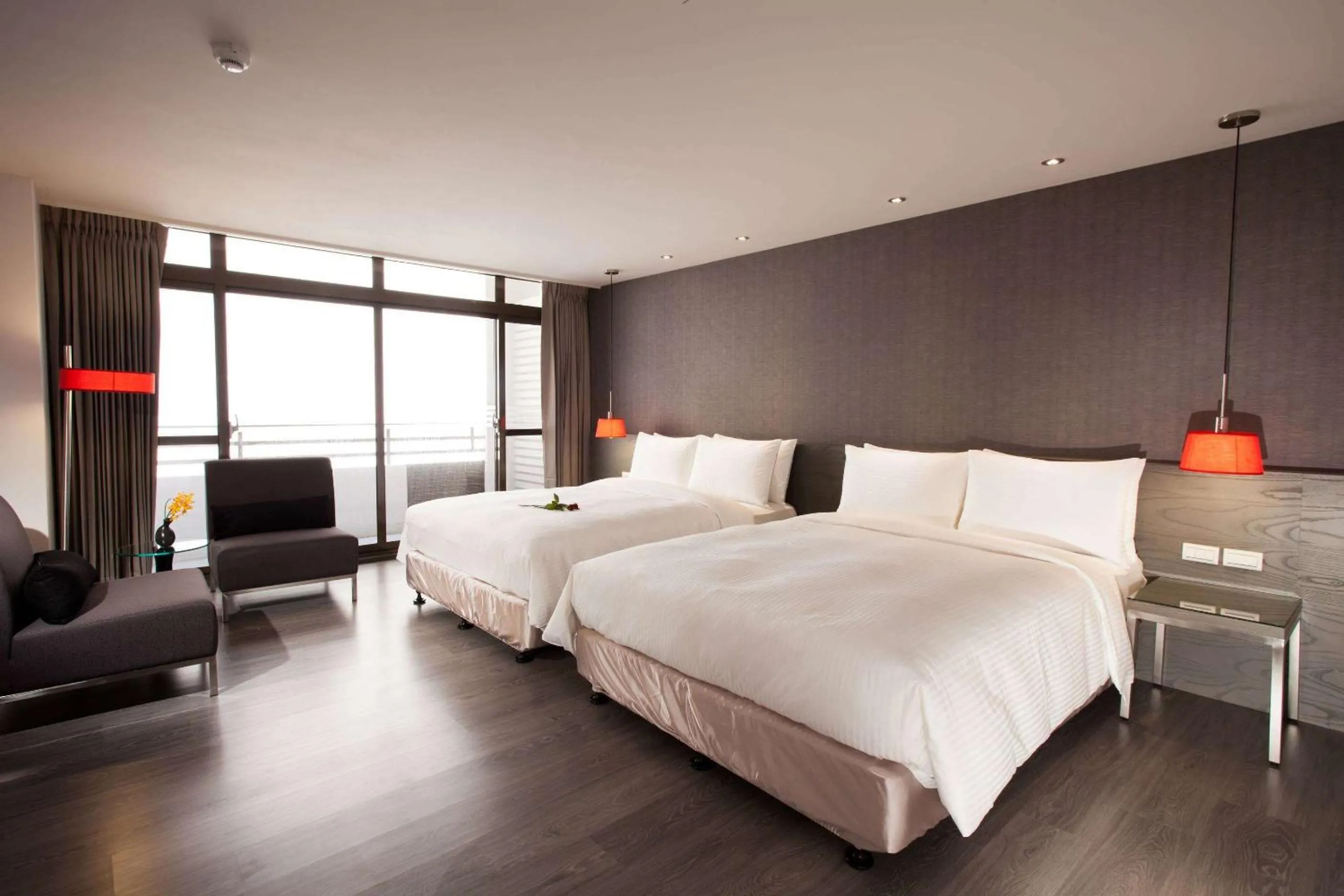 Photo of the whole room, Bed in Ramada Encore By Wyndham Hualien