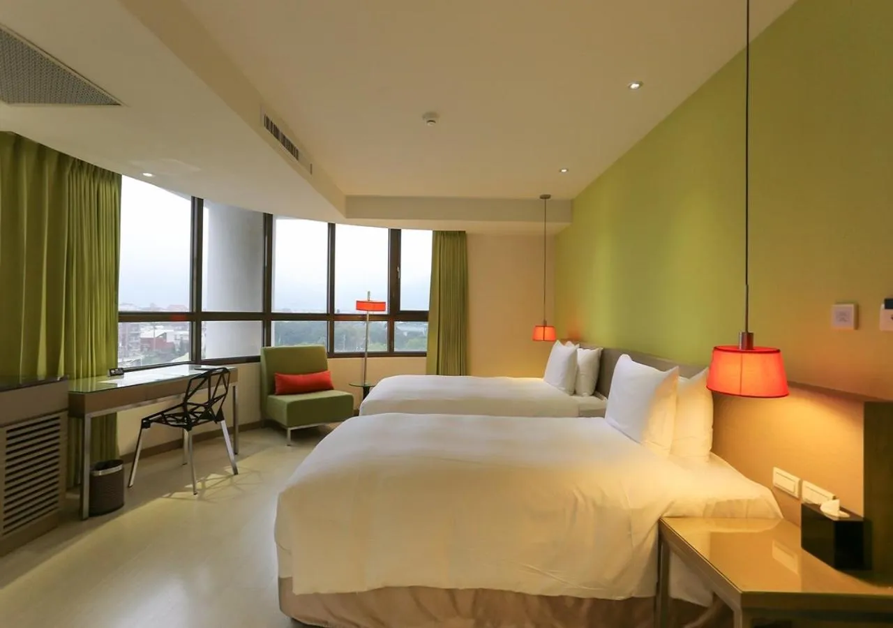 Photo of the whole room, Bed in Ramada Encore By Wyndham Hualien