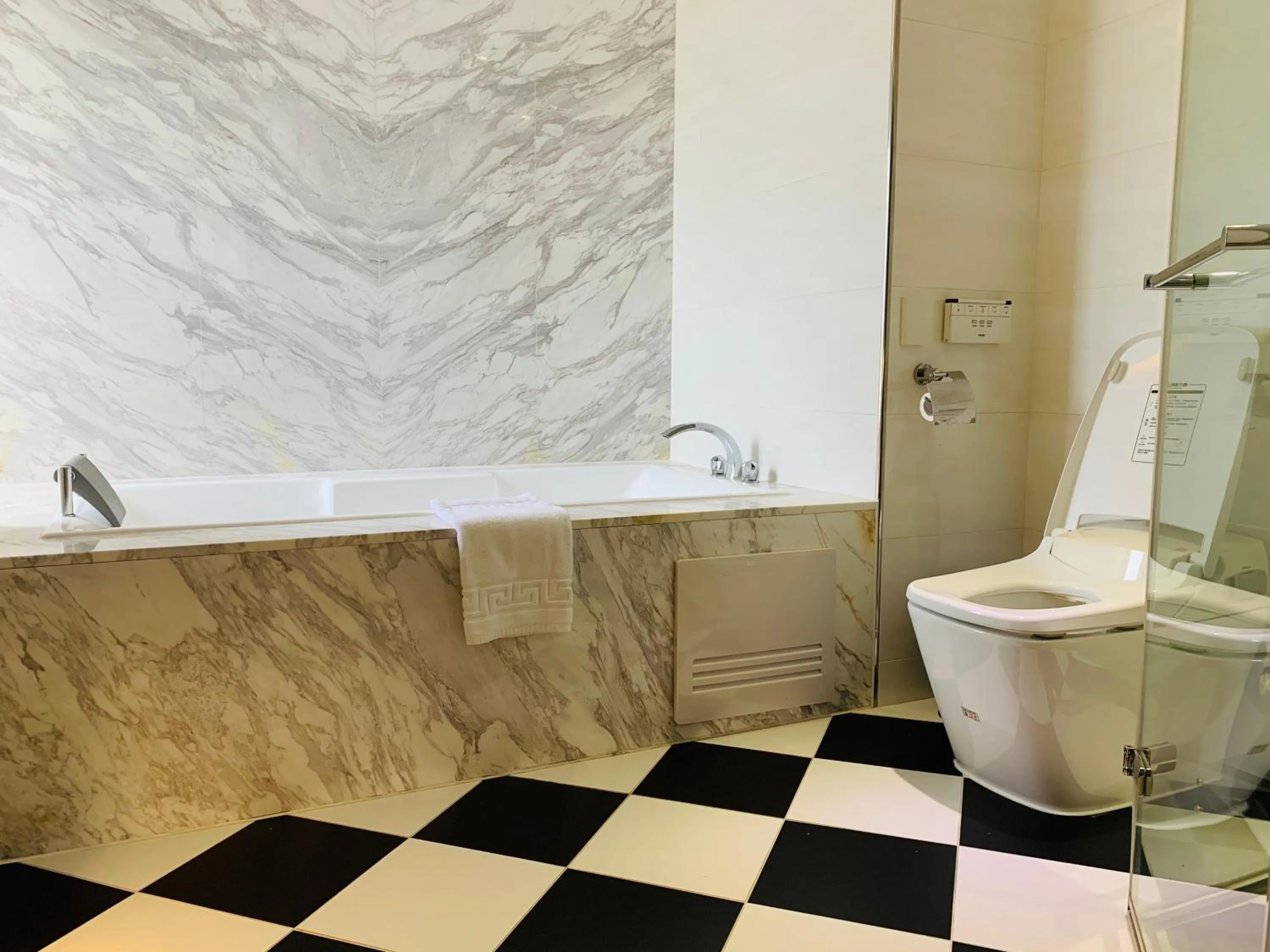 Toilet in Ramada Encore By Wyndham Hualien