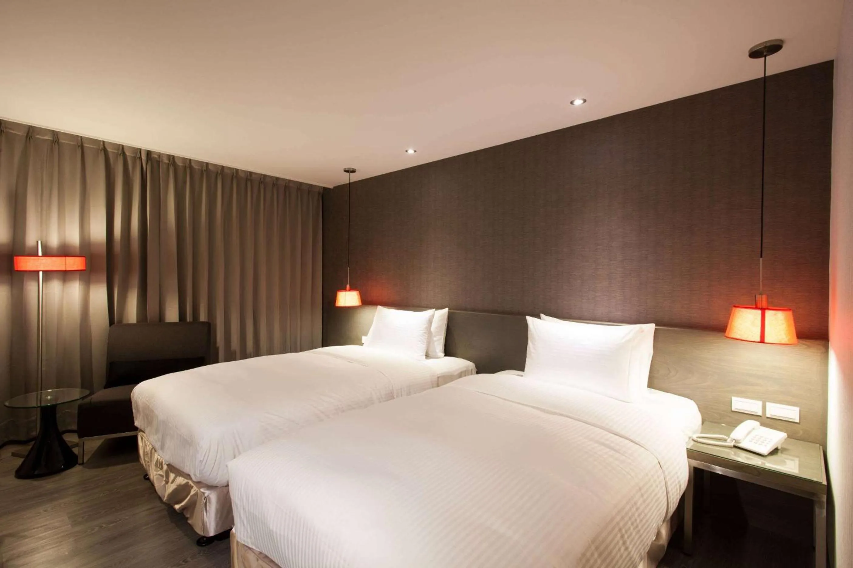Photo of the whole room, Bed in Ramada Encore By Wyndham Hualien