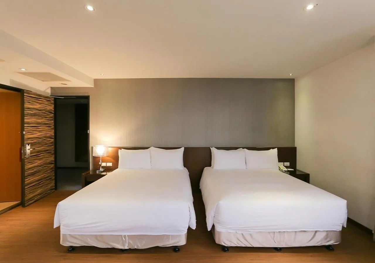 Photo of the whole room, Bed in Ramada Encore By Wyndham Hualien