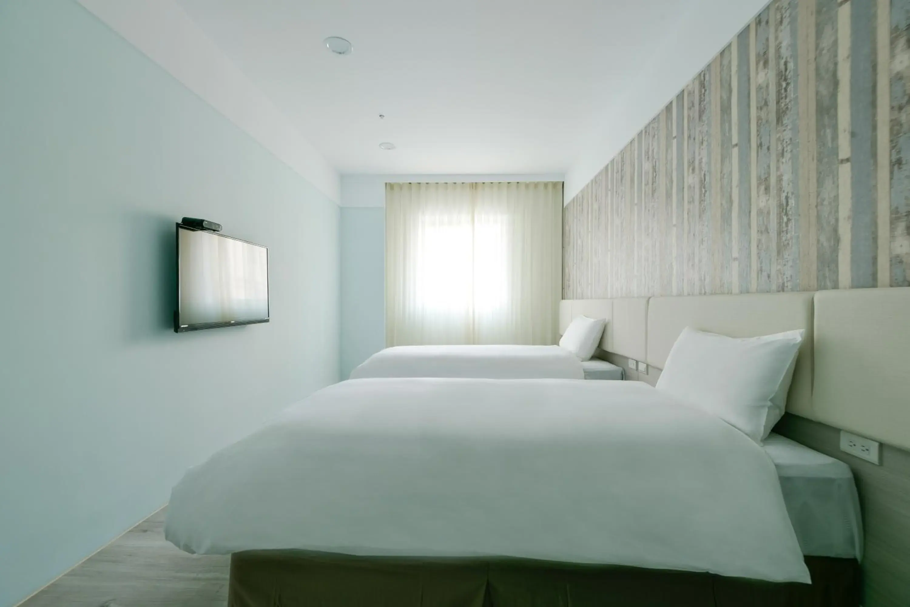 Deluxe Twin Room in Fengjia JinRui Hotel Deluxe Twin Room in Fengjia JinRui Hotel