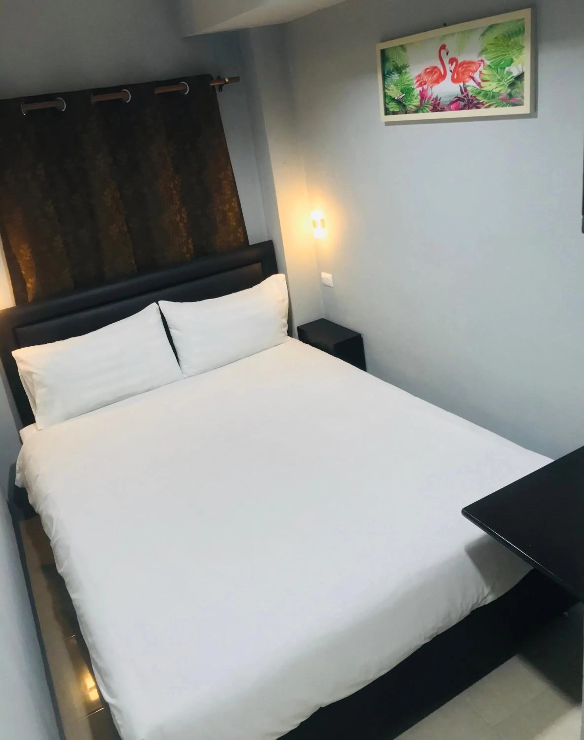 Bed in HARRYS RESIENDENCE