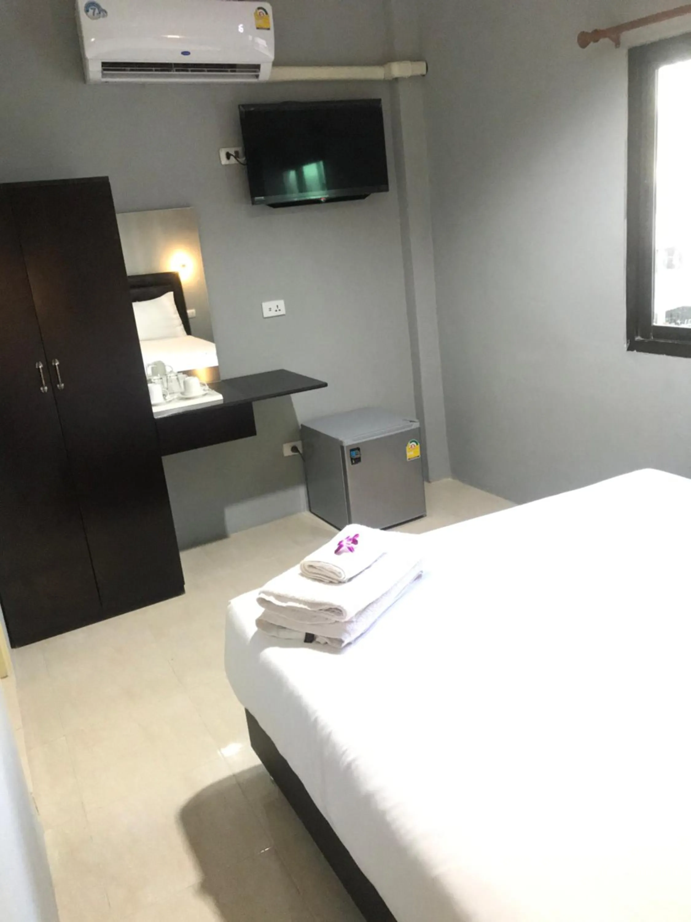 Bed in HARRYS RESIENDENCE