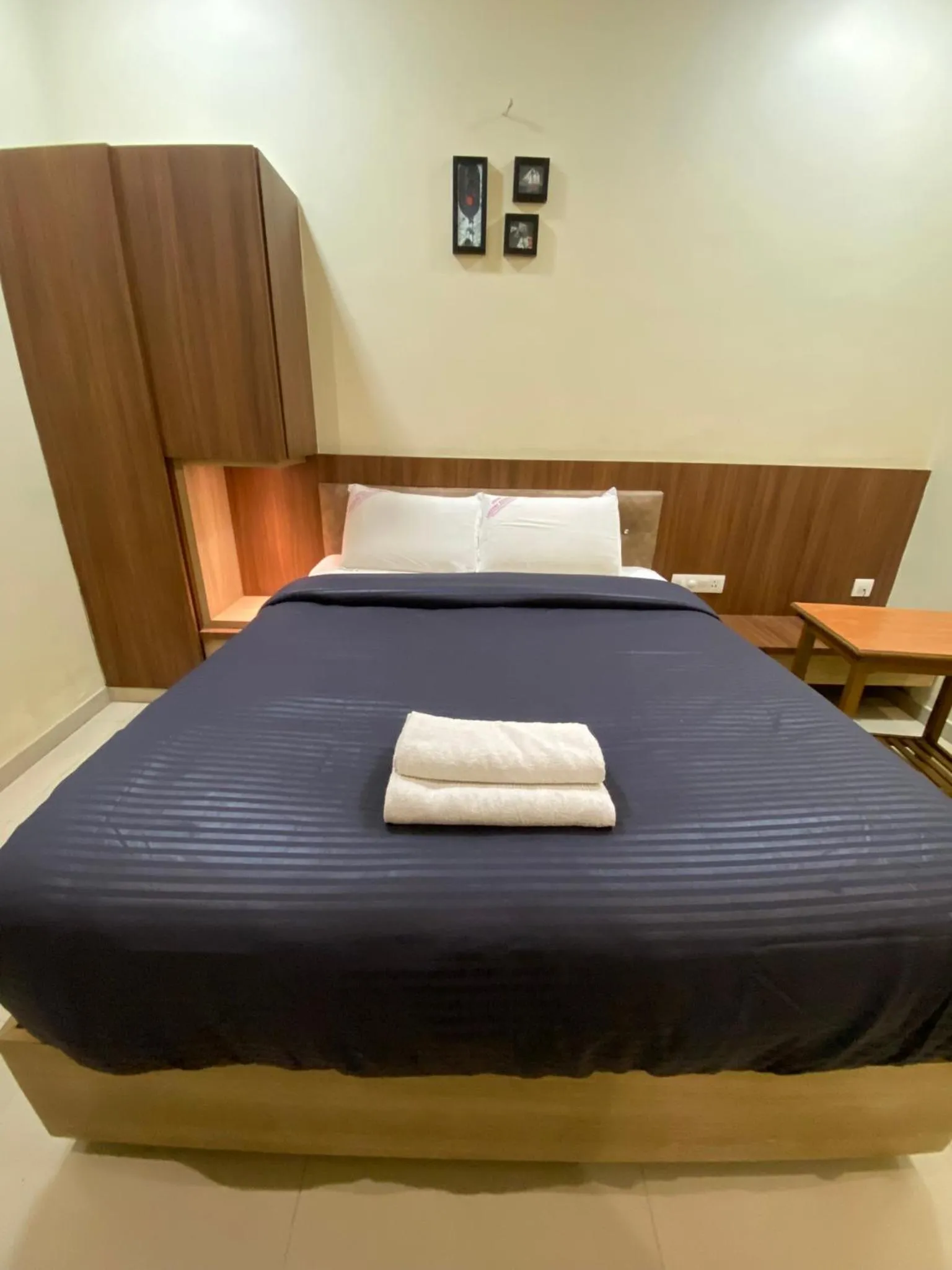 Bed in Hotel Lakshmi Residency