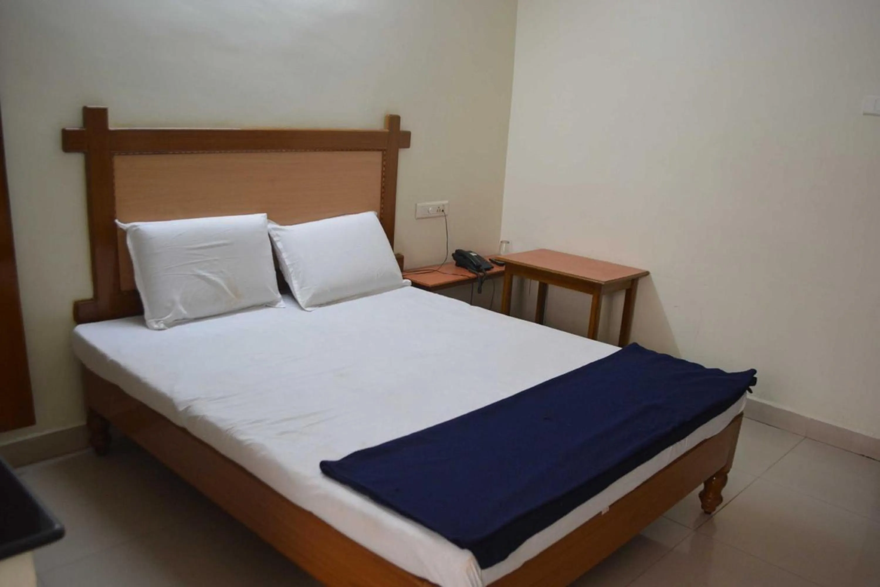 Bed in Hotel Lakshmi Residency